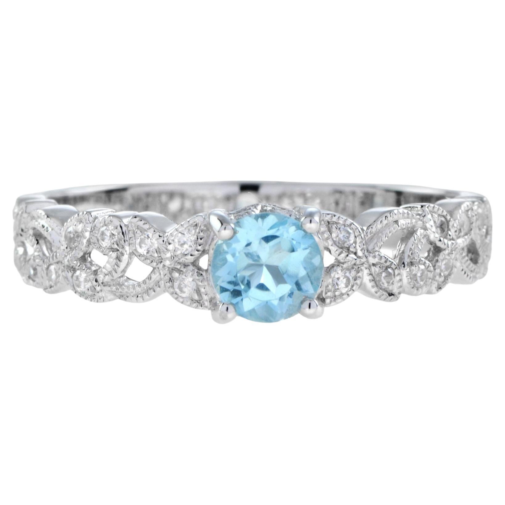 For Sale:  One Round Blue Topaz with Diamond Filigree Band Ring in 14K White Gold