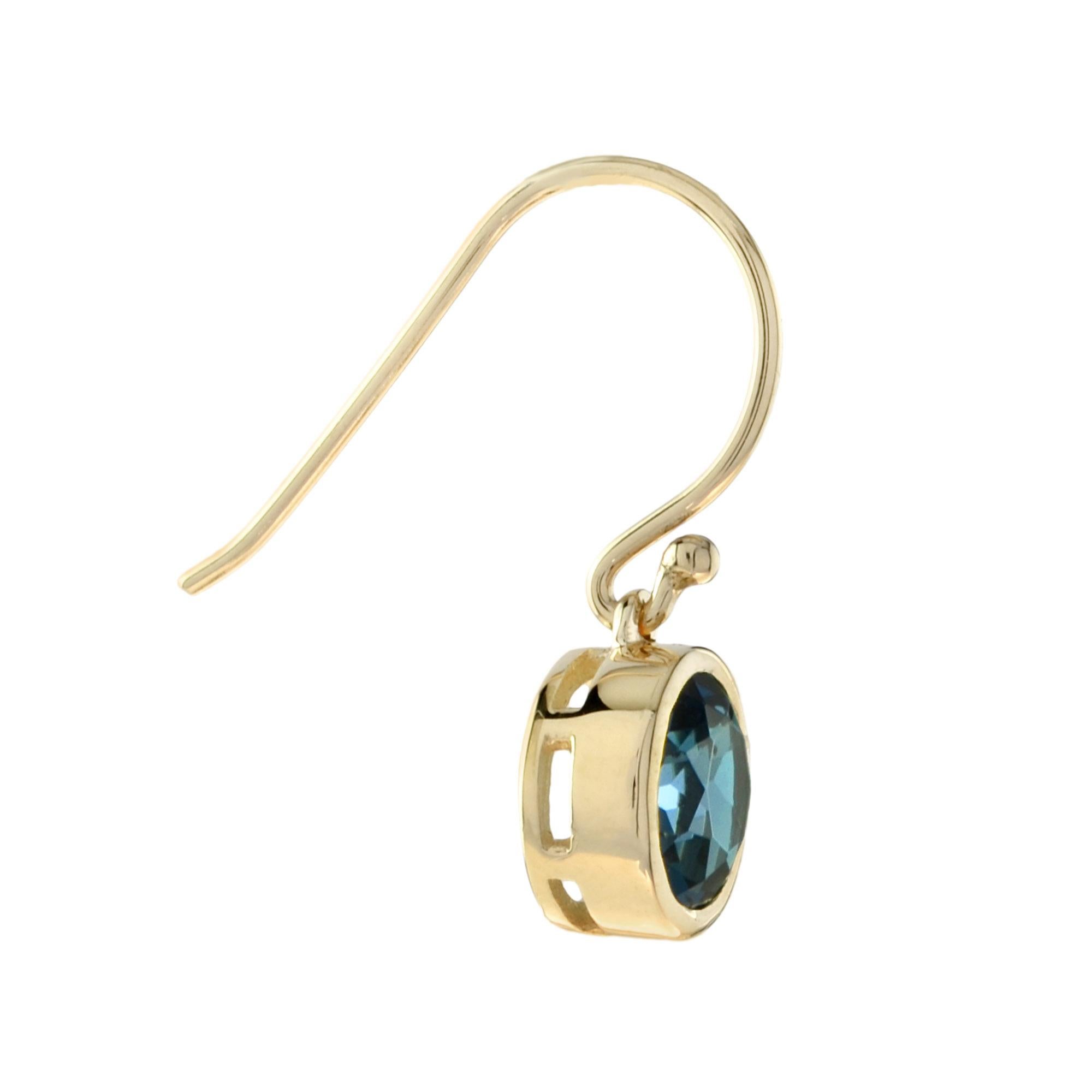 Round Cut One Round London Blue Topaz Drop Earrings in 14K Yellow Gold For Sale