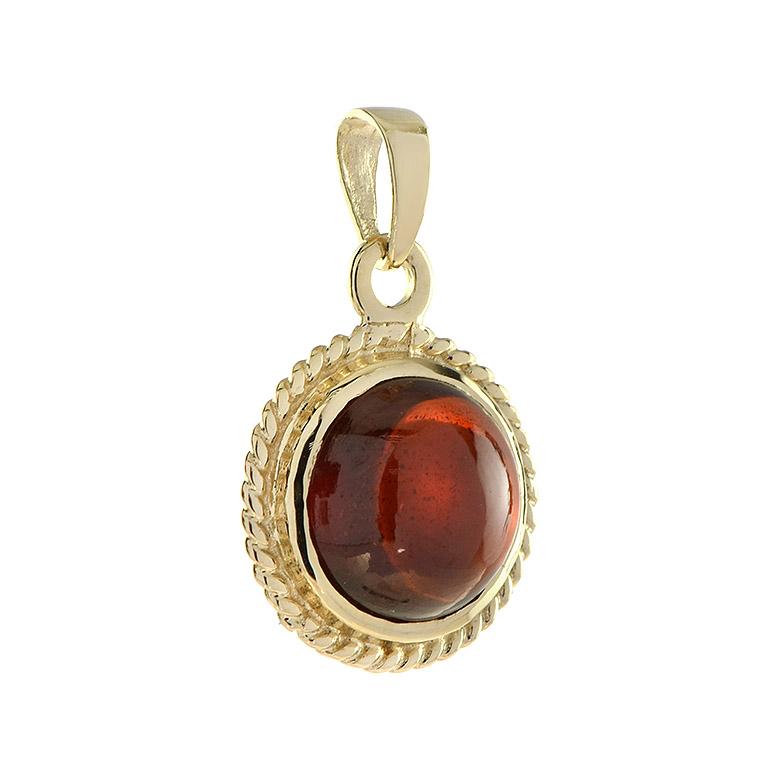 A stunning round cabochon red garnet is showcased in this 14k yellow gold pendant. The pendant is available in garnet and amethyst.

Information
Metal: 14K Yellow Gold
Width: 12 mm.
Length: 19 mm.
Weight: 1.70 g. (approx. total weight)

Center