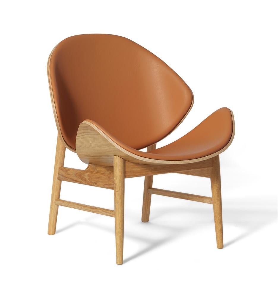 The Orange Chair Challenger White Oiled Oak Cognac by Warm Nordic
Dimensions: D64 x W71 x H 78 cm
Material: Smoked solid oak base, Veneer seat and back, Textile or leather upholstery
Weight: 9 kg
Also available in different colours, materials