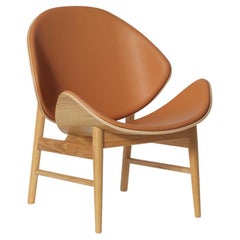La chaise Orange Challenger en chêne huilé blanc Cognac de Warm Nordic