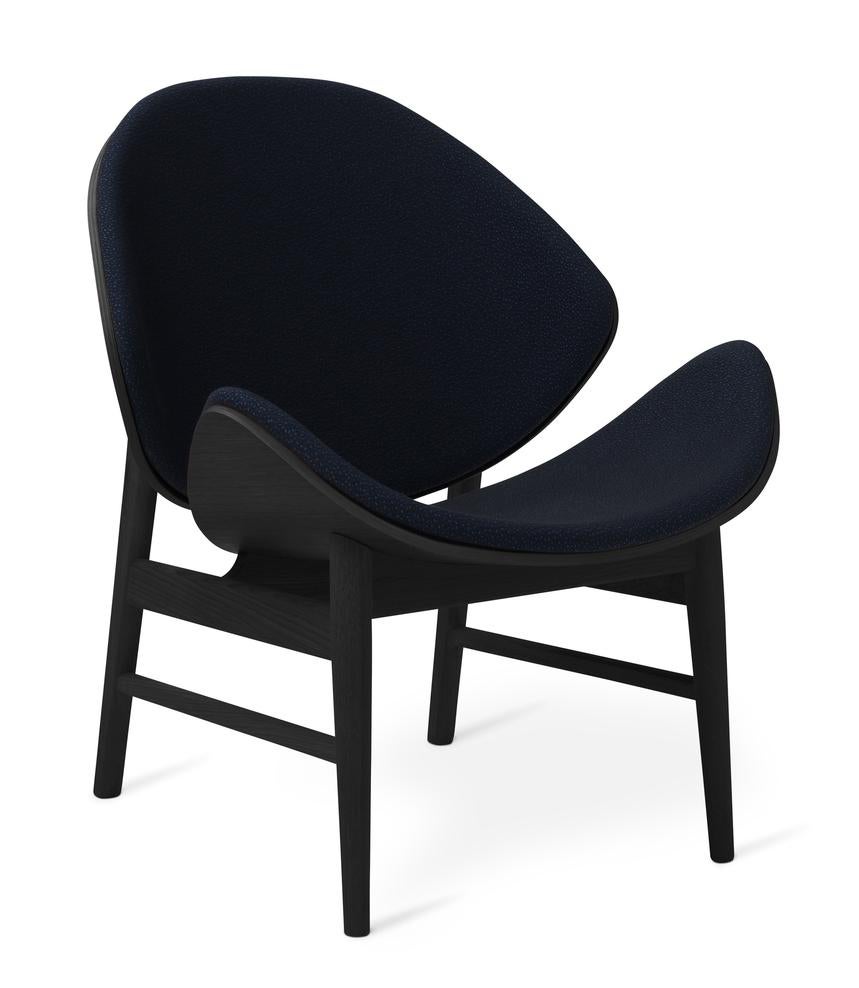 The orange chair sprinkles black lacquered oak midnight blue by Warm Nordic
Dimensions: D64 x W71 x H 78 cm
Material: Smoked solid oak base, Veneer seat and back, Textile or leather upholstery
Weight: 9 kg
Also available in different colours,
