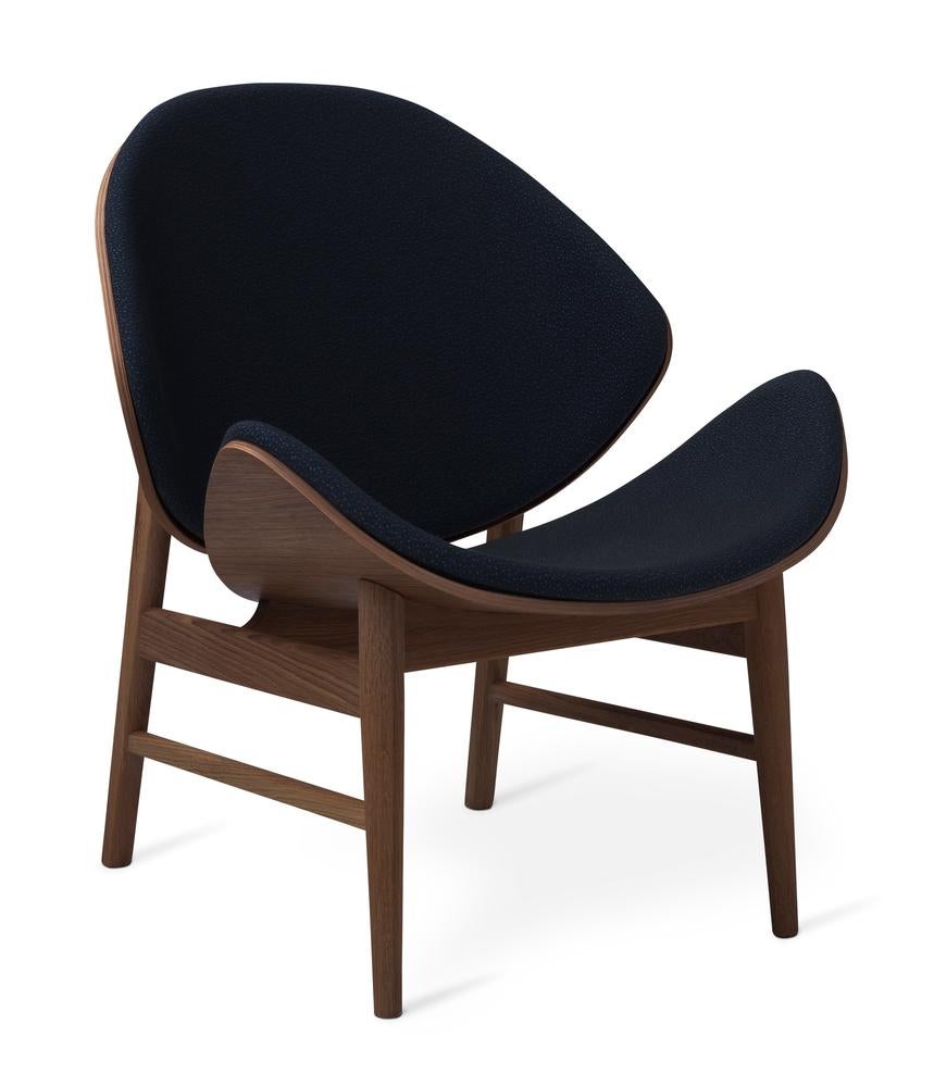 The Orange chair Sprinkles Smoked Oak Midnight Blue by Warm Nordic
Dimensions: D64 x W71 x H 78 cm
Material: Smoked solid oak base, Veneer seat and back, Textile or leather upholstery
Weight: 9 kg
Also available in different colours, materials