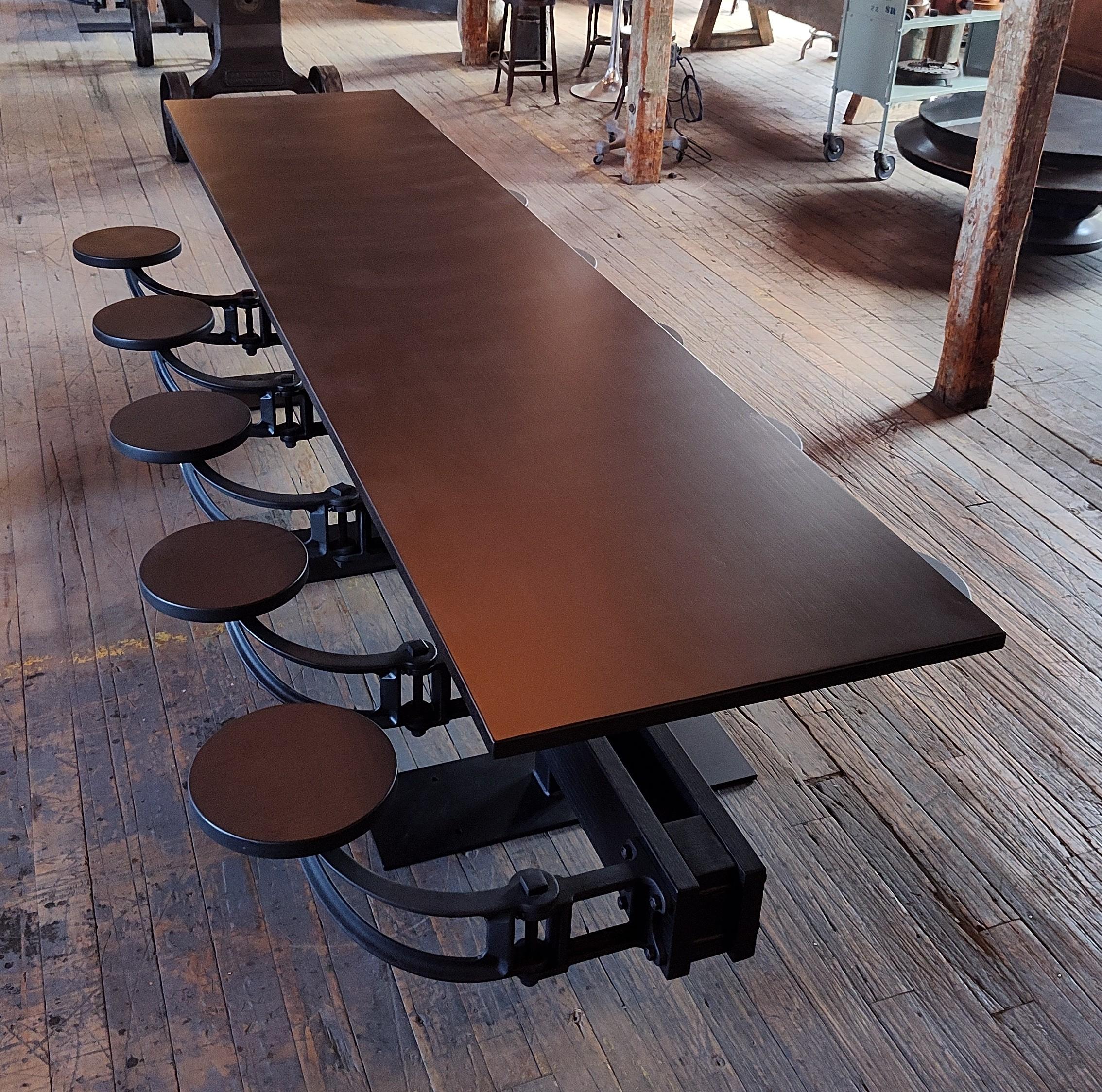 Cast The Original Swing-Out Seat Table – Triple Black with 10 Seats For Sale