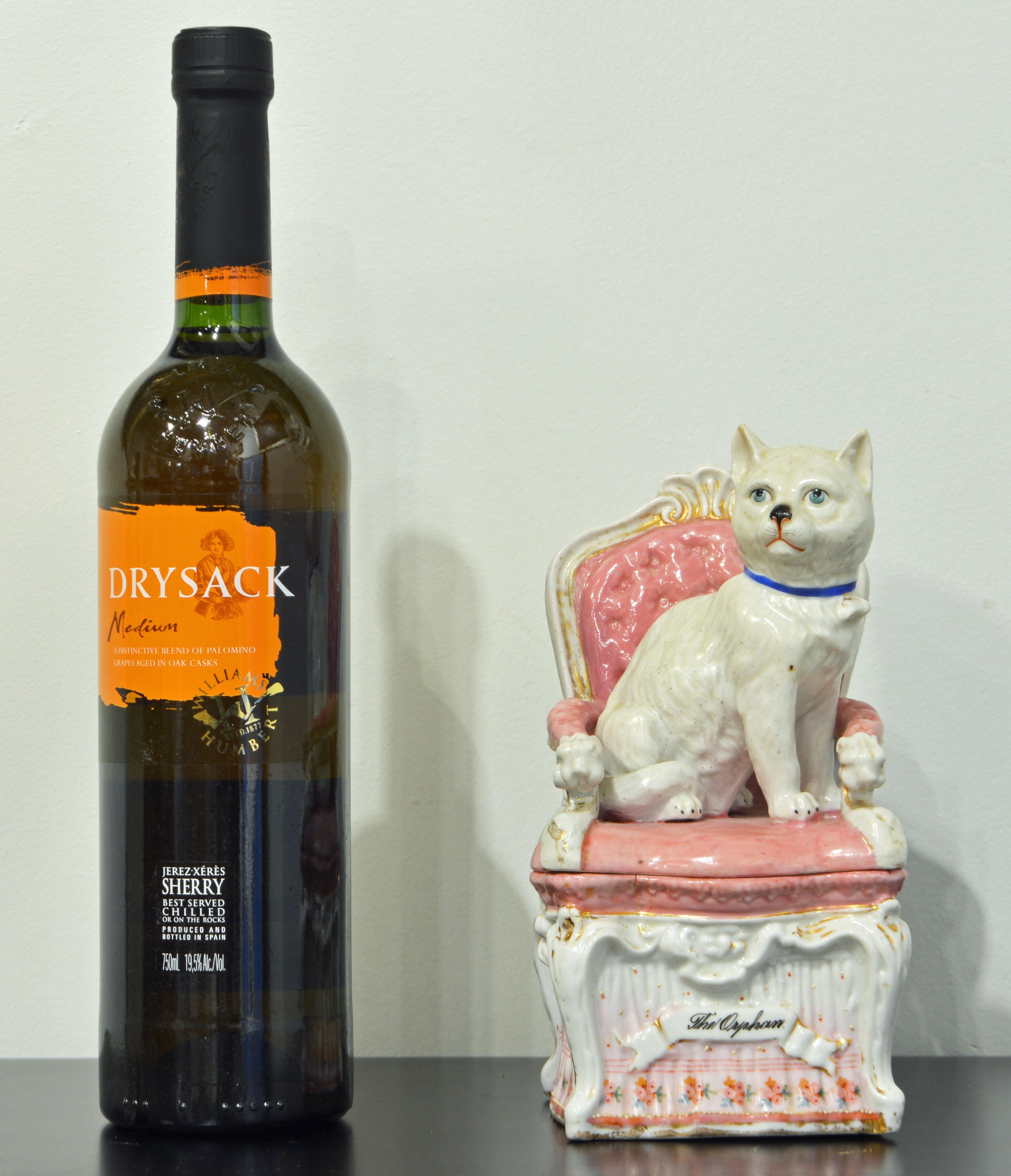 Glazed 'The Orphan' English Statfordshire Two Part Porcelain Figurine of Cat on a Chair