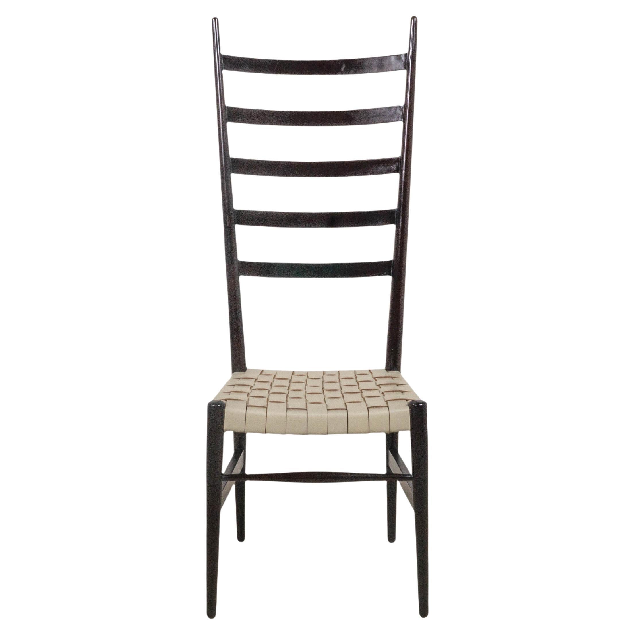 The otto Gerdan set of 8 dining chairs with basket-weave leather seats and black ladder back from Italy circa 1970 is a truly luxurious piece. The chairs feature handwoven leather seats the the basket-weave style that are both comfortable and