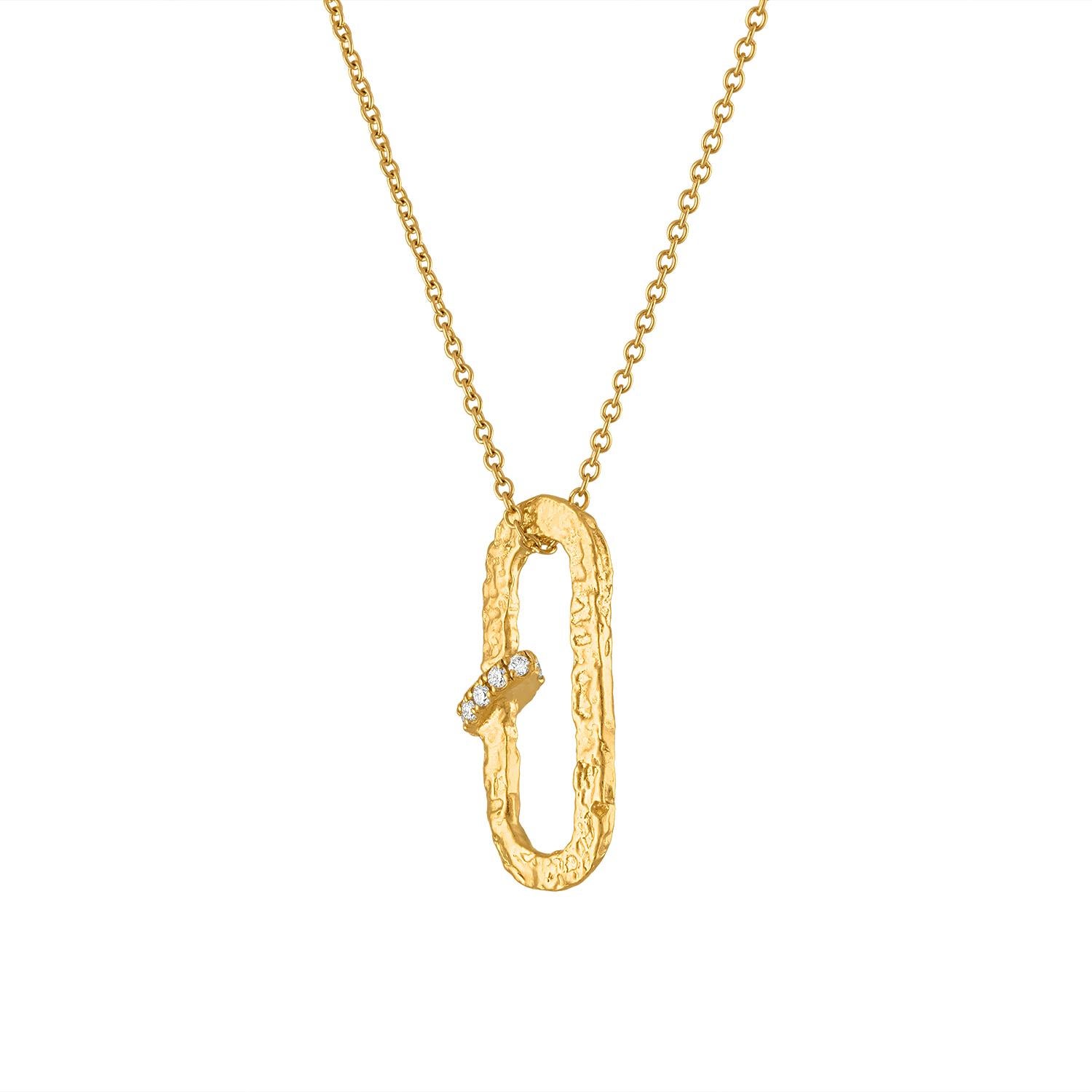 This diamond paperclip necklace is a stunning piece that combines modern design with timeless elegance. The necklace features a delicate paperclip adorned with diamonds, creating a look that is both eye catching and sophisticated. Hand made in 22k