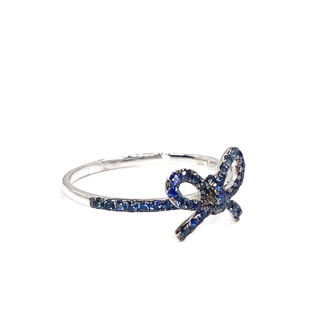 Modern The Papillan Sapphire Bow Ring in White Gold For Sale