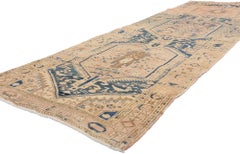 The Pastel Sovereign: A Vintage Persian Heriz Masterwork of Tribal Elegance