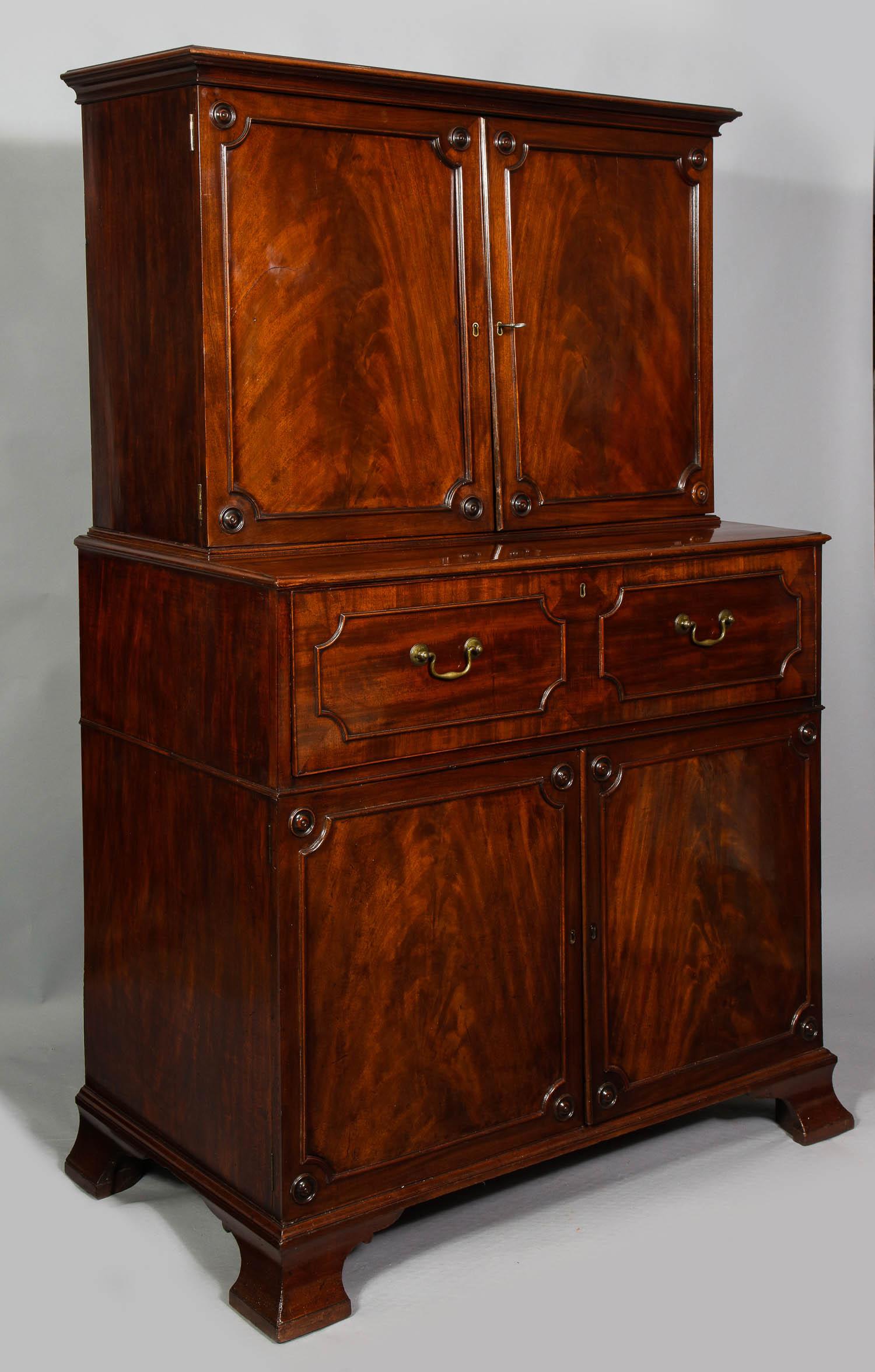 The Paxton House Secretaire, circa 1775

A George III mahogany secretaire in two parts, the upper case with vividly grained doors concealing 24 pigeonholes over four drawers, the lower section with pullout secretary drawer with interior comprising