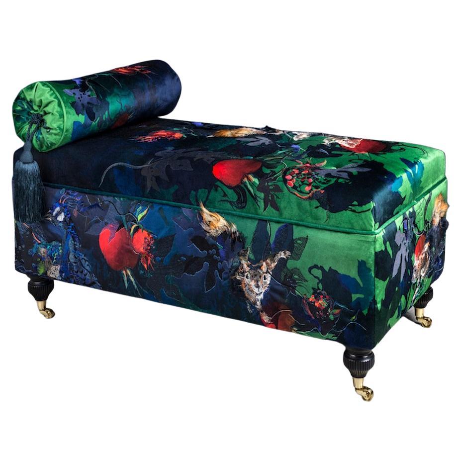 Embroidered velvet ottoman in a variety of textiles by award-winning artist