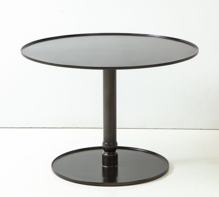 Pedestal Steel Table”, Hand Blackened Patina with Cast Base and Forged Edges.

Made to Order. Standard Finish: Hand-rubbed Wax

Custom Sizes, Finish, and Materials

Leather Top Insert Optional

H: 27 Diam. 37.75 inches ONE IN STOCK

Lead