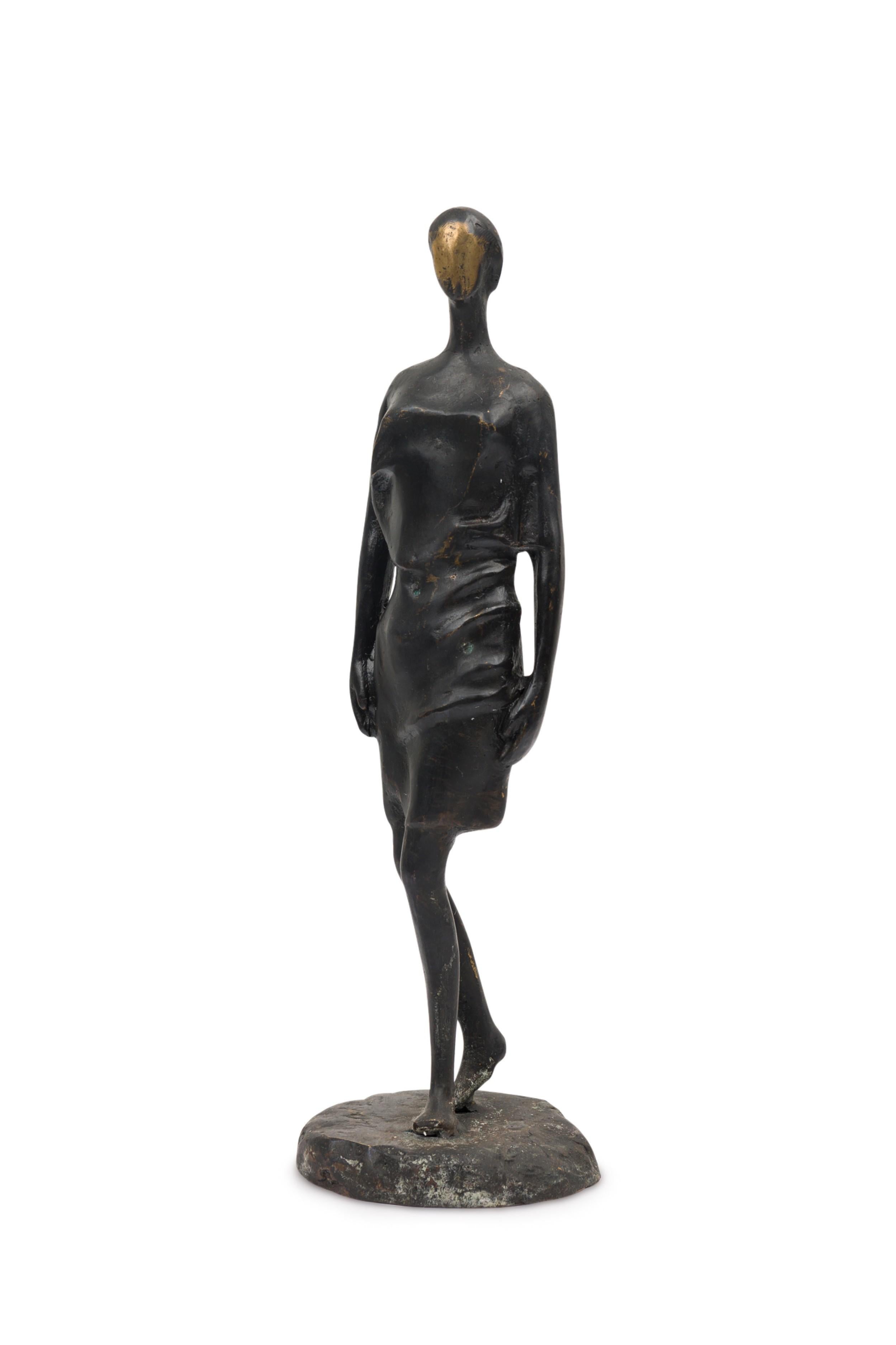 Contemporary hand-forged bronze Brutalist-inspired figural sculpture depicting a female walking figure finished in an ebonized patina. (PRICED EACH) (