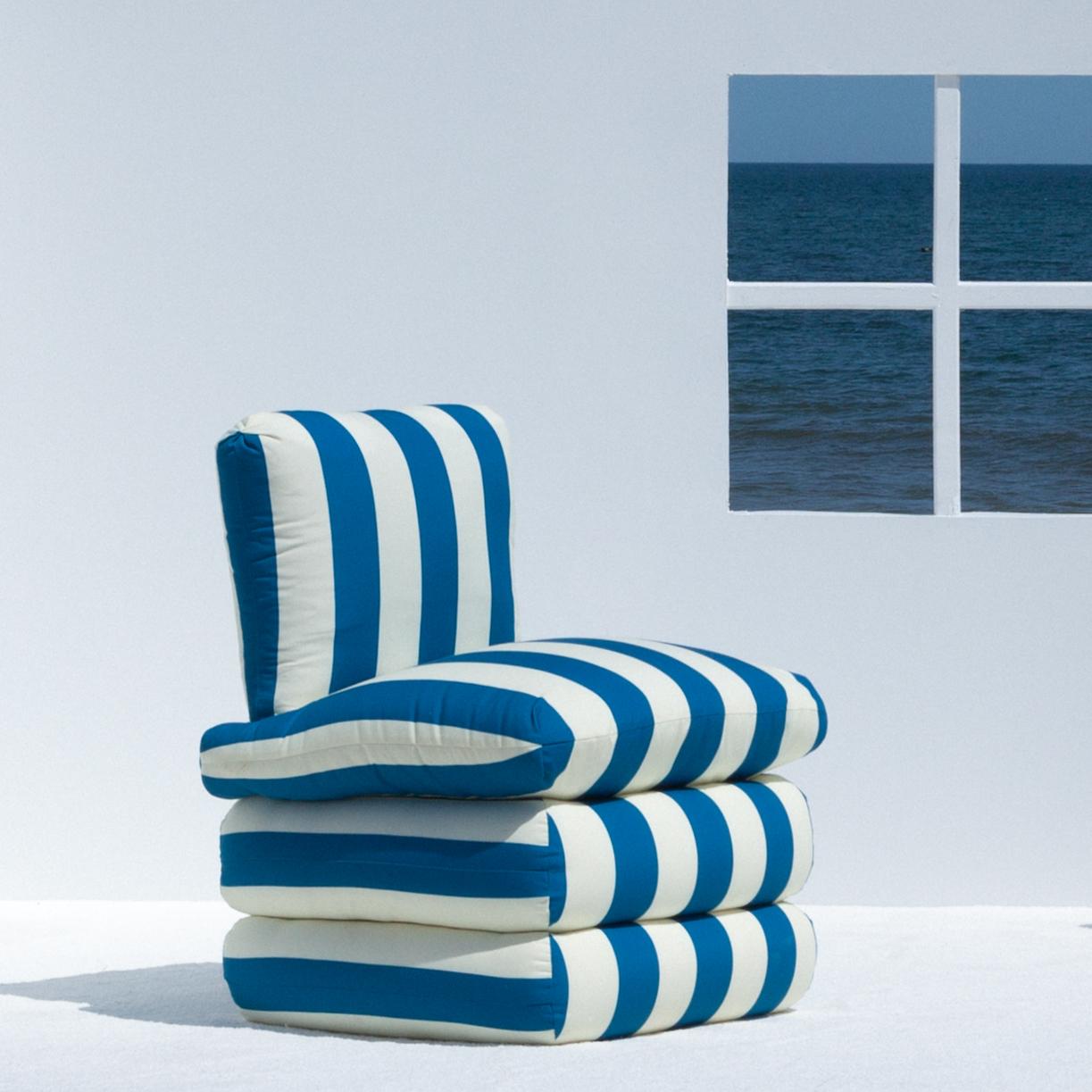 Inspired by the relaxed glamour of the 1960s Italian Riviera, our new Pillow Chair physically embodies the longing for lazy summer days with a comfortable, fully upholstered chair in colorful and classic stripes. 

The upholstered shape brings to