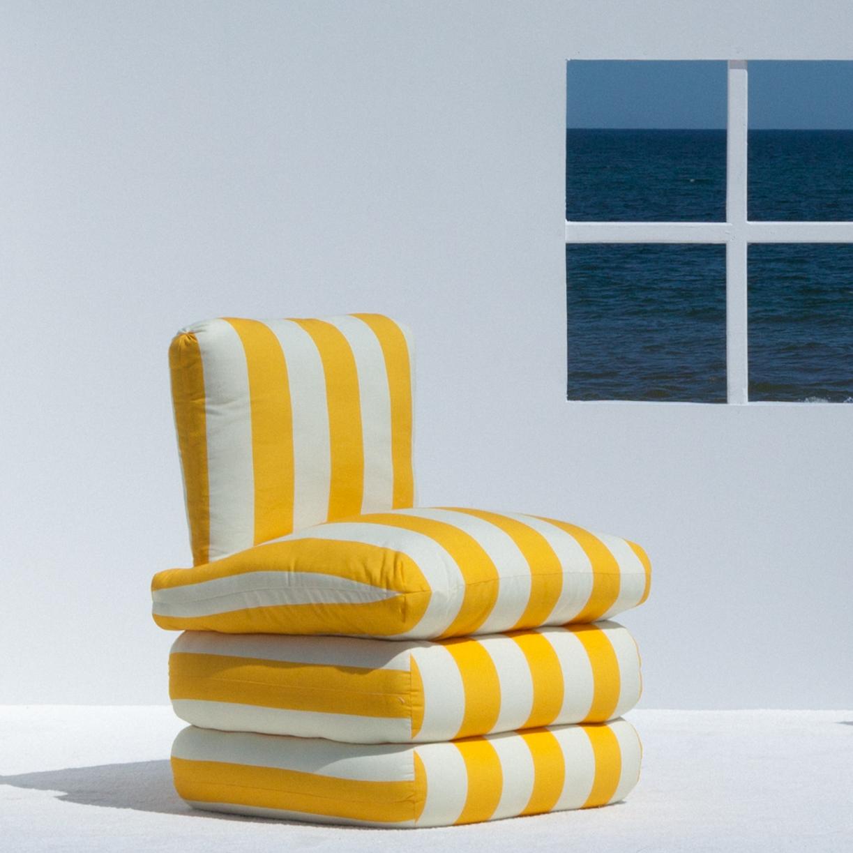 Inspired by the relaxed glamour of the 1960’s Italian Riviera, our new Pillow Chair physically embodies the longing for lazy summer days with a comfortable, fully upholstered chair in colorful and classic stripes. 

The upholstered shape brings to