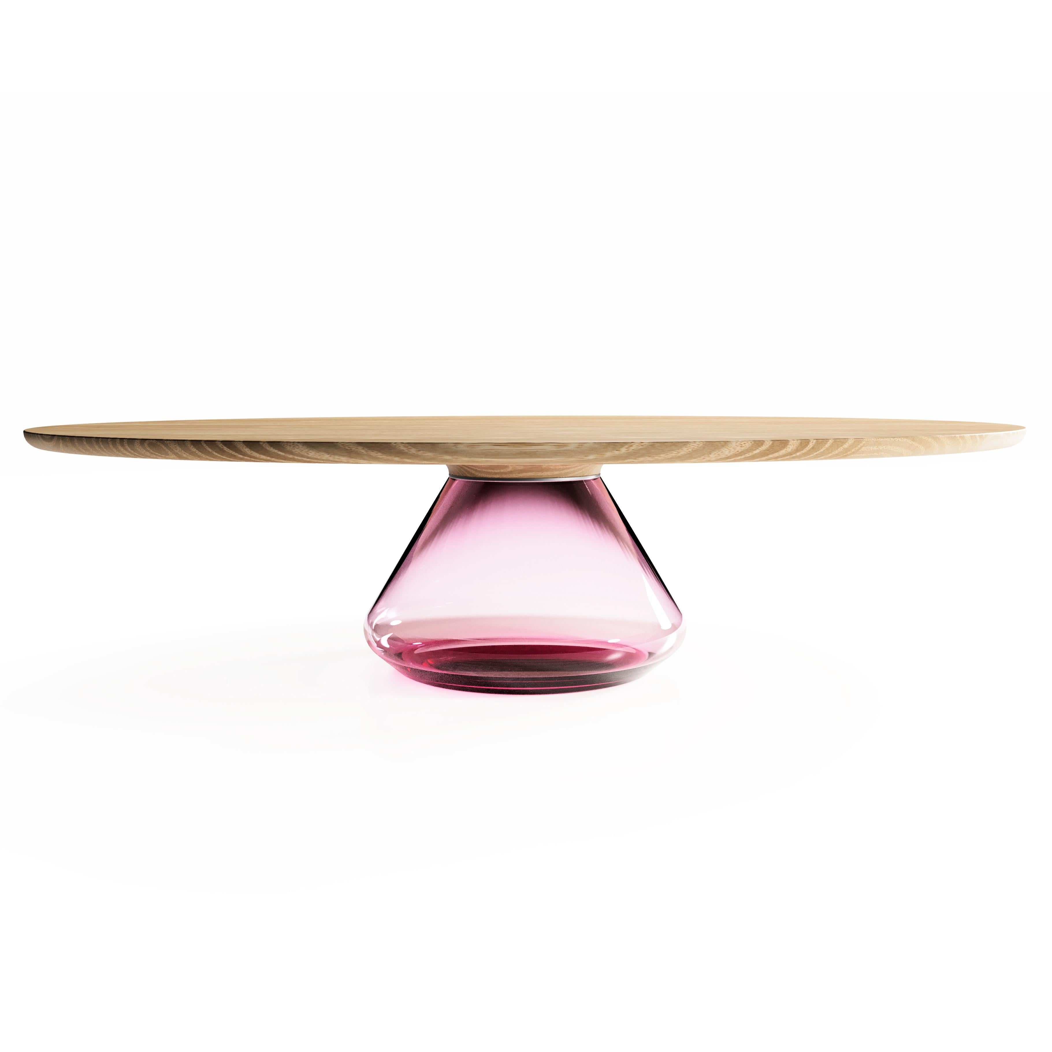 The pink lady Eclipse I, limited edition coffee table by Grzegorz Majka
Limited edition of 8
Dimensions: 54 x 48 x 14 in
Materials: Glass, oak

The total eclipse of every interior? With this amazing table everything is possible as with its