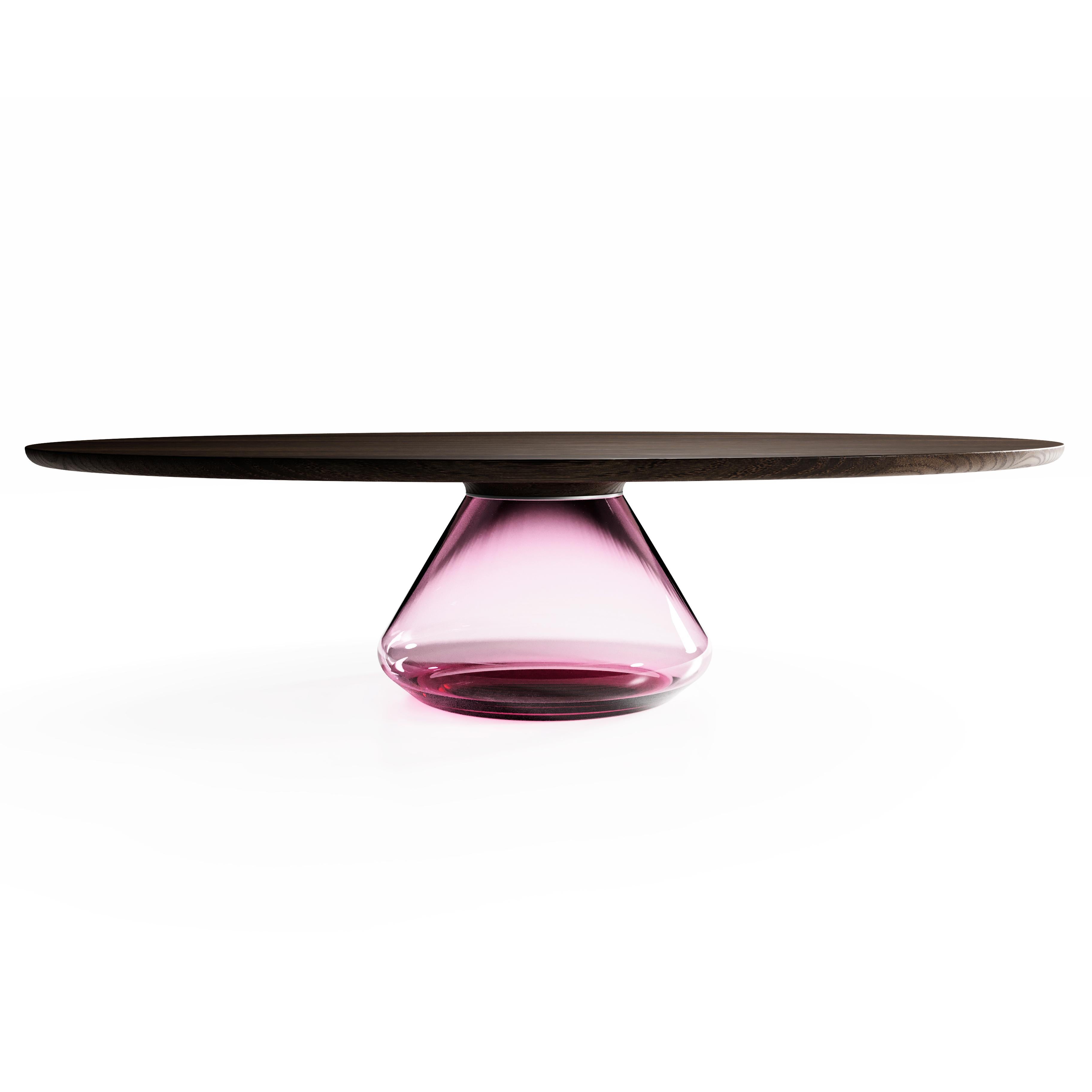 The pink lady Eclipse I, limited edition coffee table by Grzegorz Majka
Limited edition of 8
Dimensions: 54 x 48 x 14 in
Materials: glass, oak

The total eclipse of every interior? With this amazing table everything is possible as with its