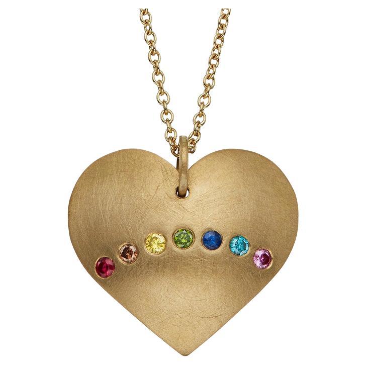 The Rainbow Heart Warrior Amulet 18ct Fairmined Gold, Rubin, Saphir, Diamanten.