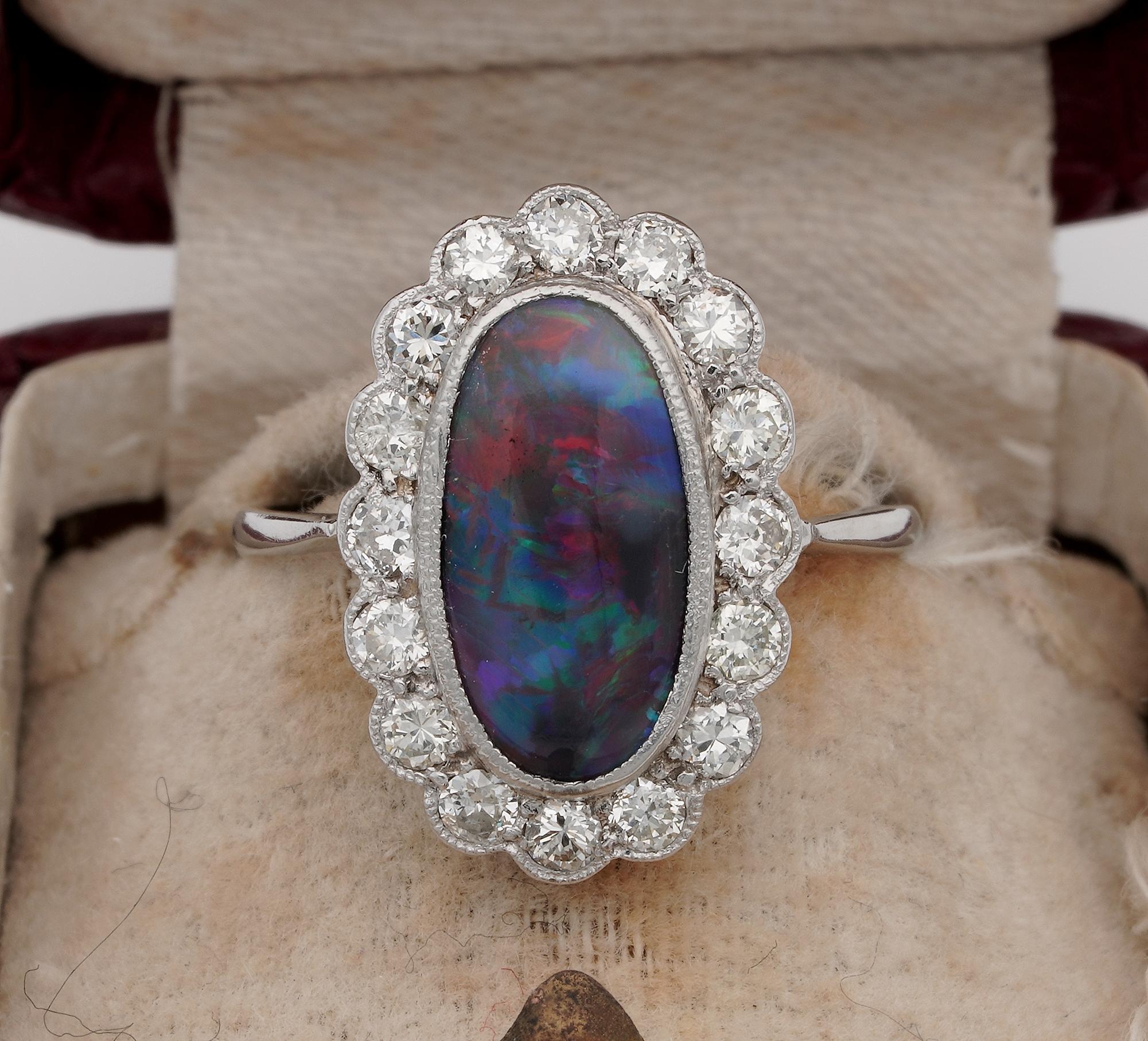 The Rarity Corner

Sensational antique Edwardian period Diamond and Black Opal engagement ring
Hand crafted of solid Platinum bearing assay mark, 1915/20 ca
Centrally set with an amazing Australian solid Black Opal, holding a rich colours palette as