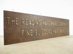 The Reading Hardware Company's Wood Brass Wall Sign