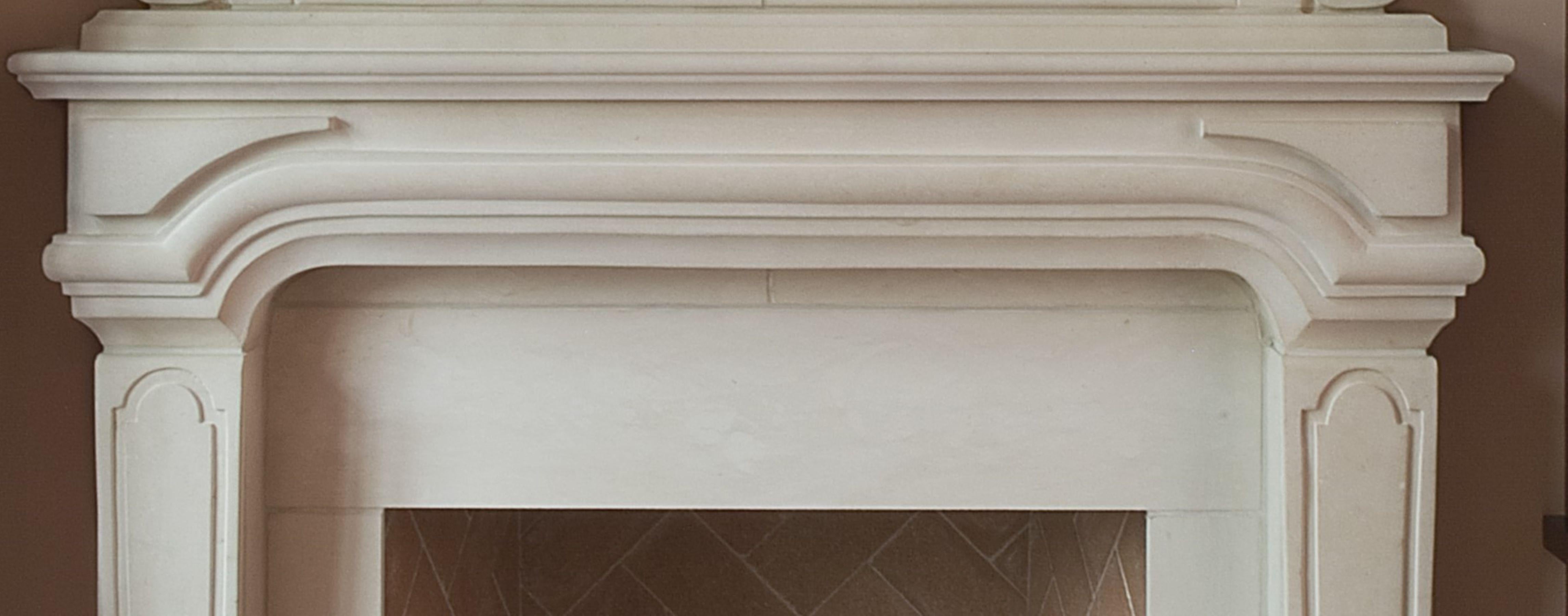 Carved The Regency: A Classically-Inspired English Stone Fireplace with Overmantel  For Sale