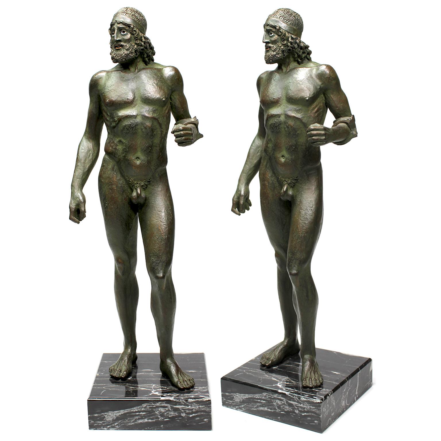 The Riace Warriors, a fine pair of cold cast copper and resin figures of the Riace Warriors, reduced replicas of the original bronze sculptures currently located at the Museo Nazionale della Magna Grecia in the southern Italian city of Reggio