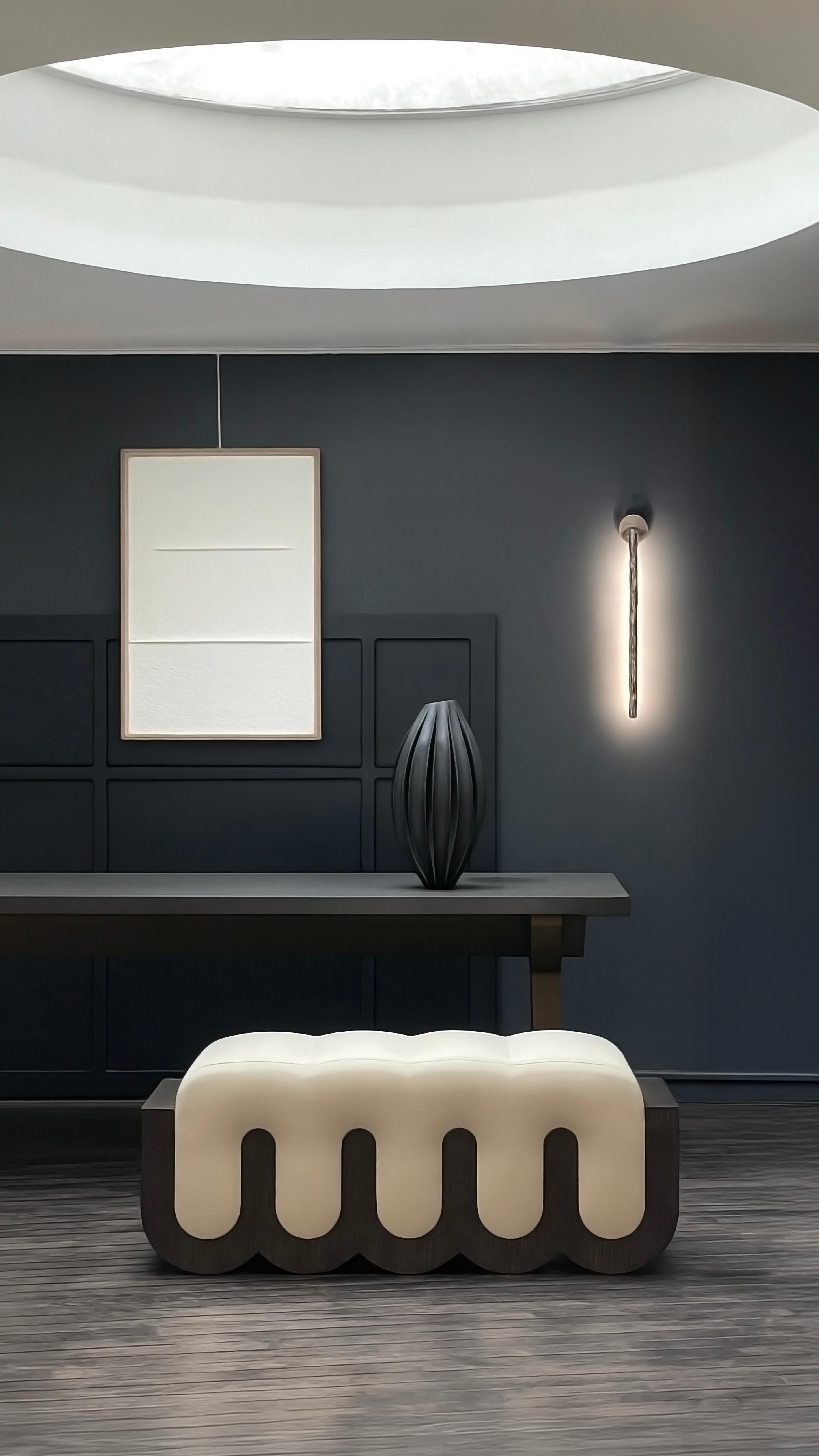 Following Rooly, Rooooly stands out as the natural evolution of the first model. Its graphic and iconic character unfolds like an alphabet of shapes. This idea of language is expressed here in a minimalist style where each shape, stripped of