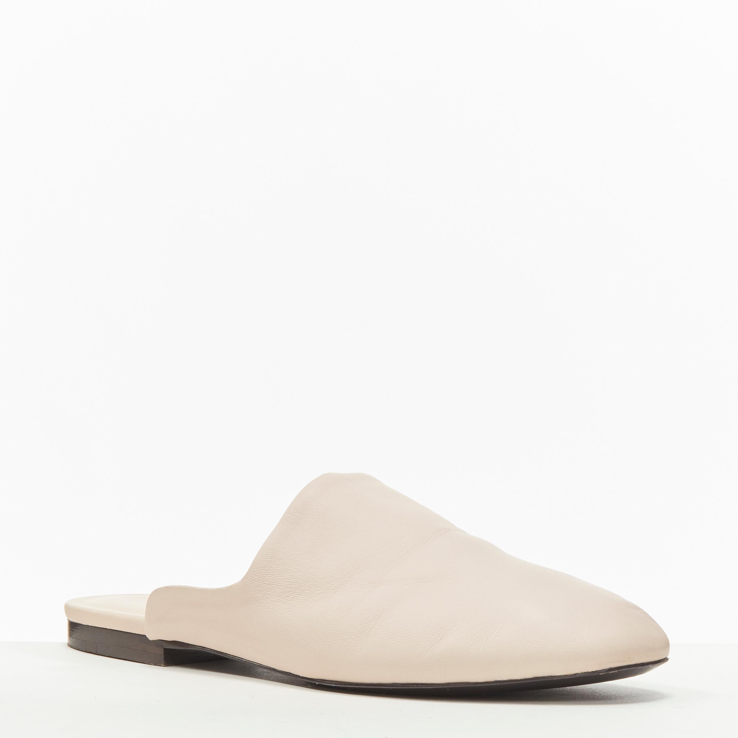 THE ROW 2019 light beige soft leather minimal slip on mule slippers EU37 
Reference: LNKO/A02025 
Brand: The Row 
Material: Leather 
Color: Beige 
Pattern: Solid 
Extra Detail: Extremely soft buttery supple leather. Stacked wooden heel.