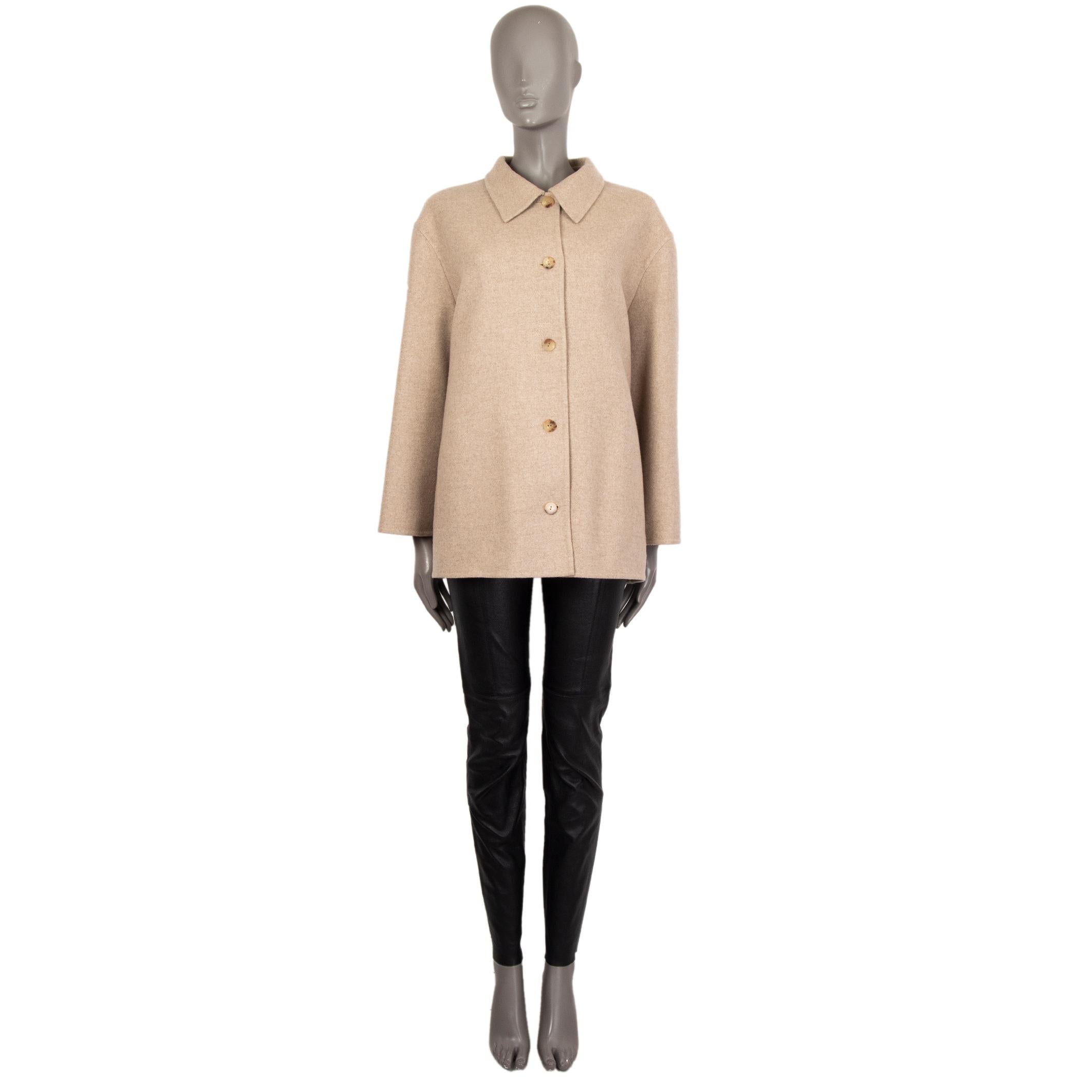 100% authentic The Row jacket in beige cashmere (100%). With flat collar and two pockets on the front. Closes with horn buttons on the front. Sleeve lined in beige cupro (100%). Has been worn and is in excellent condition. 

Measurements
Tag