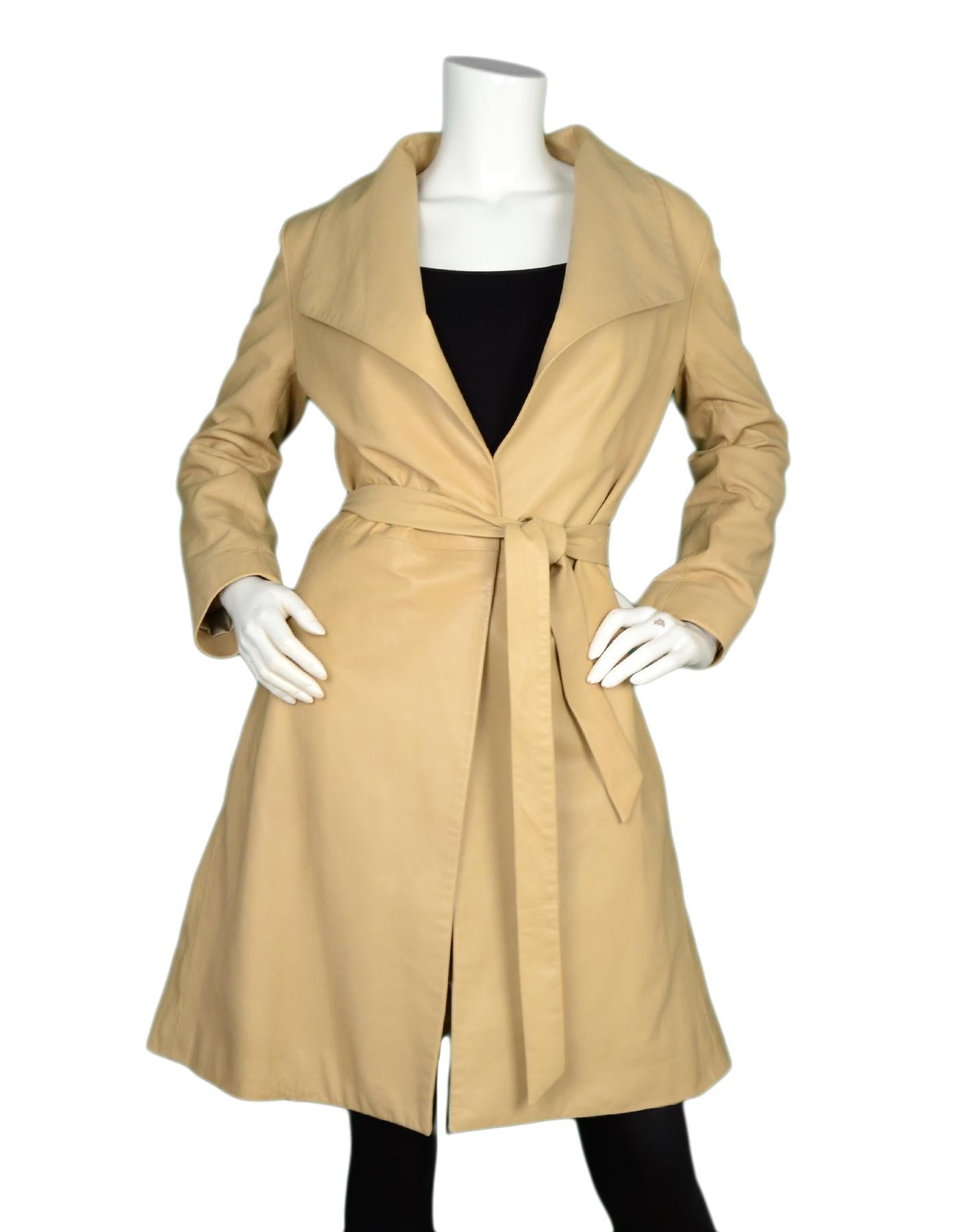 The Row Beige Leather Wrap Coat W/ Belt Sz 8

Made In: USA
Color: Beige
Materials: Leather (no composition tag)
Lining: Polyester (no composition tag)
Opening/Closure: Open front with belt
Overall Condition: Very good pre-owned condition with