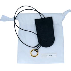 The Row Portachiavi Billy in pelle color oro