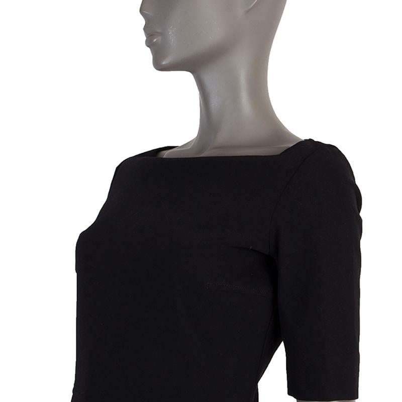 The Row 3/4-sleeve sheath dress in black cotton (52%), nylon (38%), and elastane (10%). Closes with invisble zipper on the back. Lined in black silk (93%) and elastane (7%). Has been worn and is in excellent condition.

Tag Size 4
Size S
Shoulder
