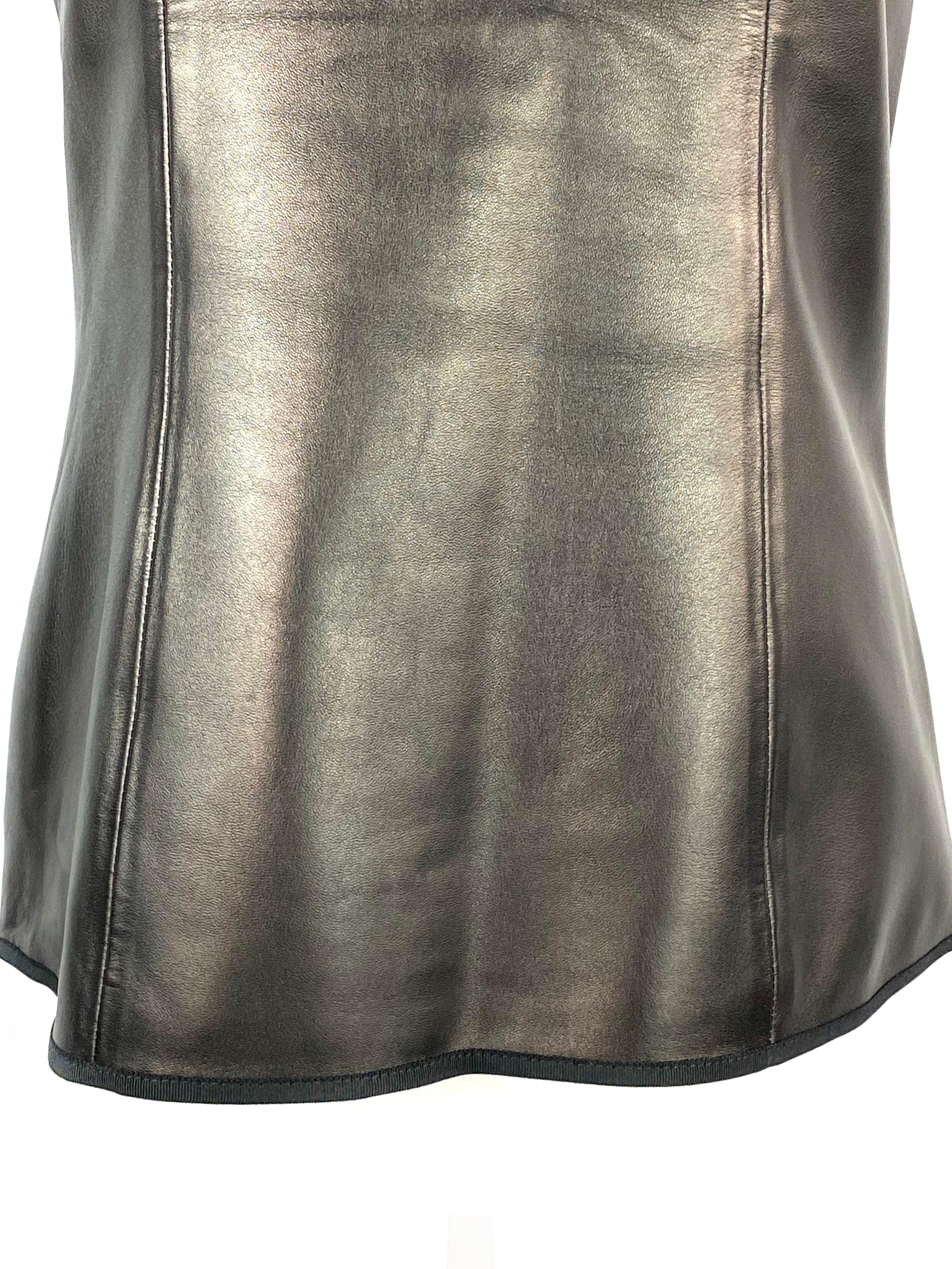 THE ROW Black Lambskin Leather Sleeveless Top Size 8

Product details:
Size 8
Black lambskin leather
Sleeveless 
Rear zip closure 
Made in USA

