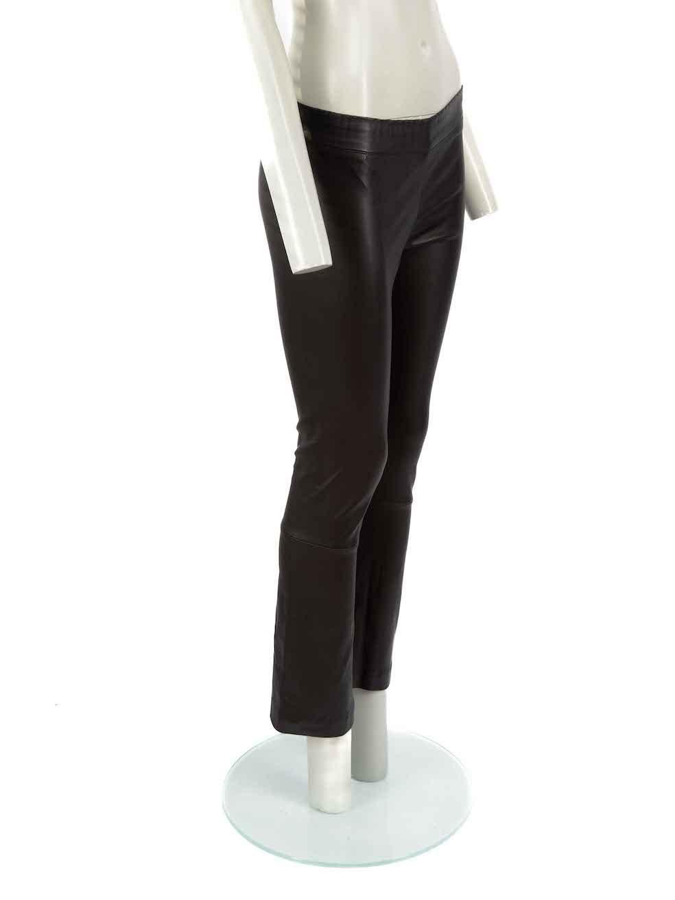 CONDITION is Very good. Hardly any visible wear to trousers is evident on this used The Row designer resale item.
 
Details
Black
Leather
Bootcut trousers
Mid rise
Elasticated waistband
 
Made in USA
 
Composition
100% Lambskin
 
Care instructions:
