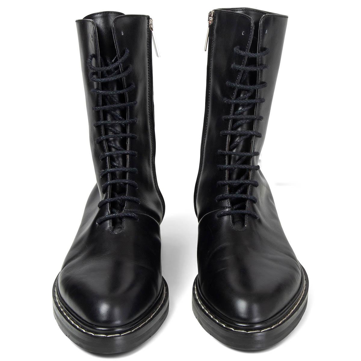 100% authentic The Row Fara lace-up combat boots in black smooth leather with white stitching details. Open with a zipper on the inside. Have been worn once or twice and are in excellent condition. Come with dust bag. 

Measurements
Imprinted