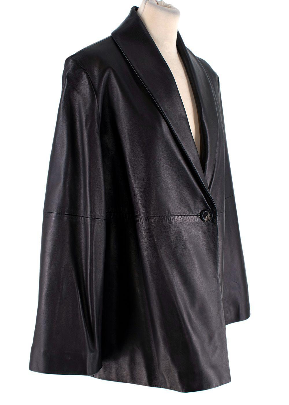 The Row Black Smooth Leather Single-Breasted Blazer

- Black smooth and supple leather
- Single breast, single-button closure
- Shawl collar
- Swing back silhouette and flared sleeves

9.5
Excellent condition

Materials:
Leather

Made in USA

PLEASE