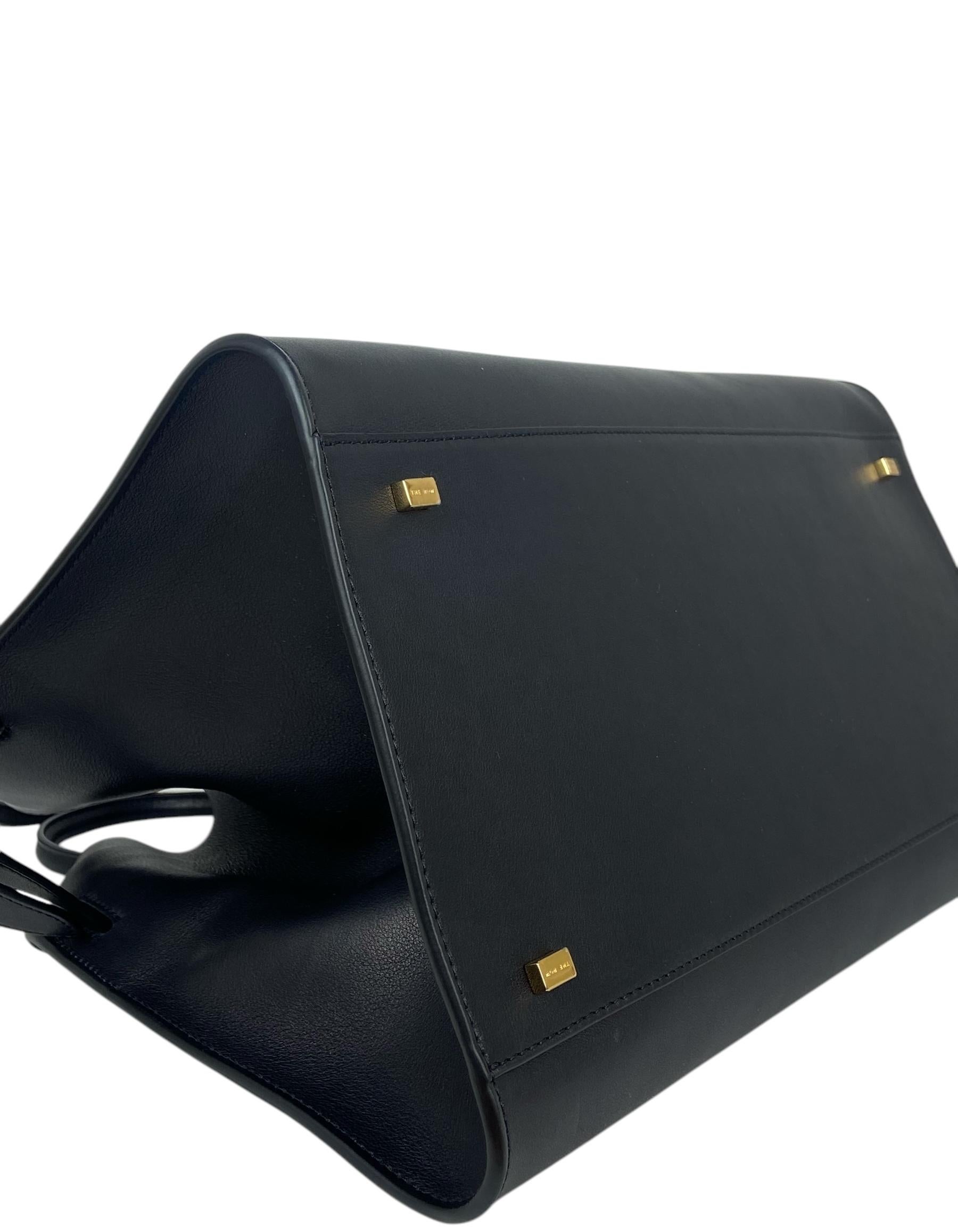 The Row Sac Margaux 15 en cuir de veau souple poli noir Pour femmes en vente