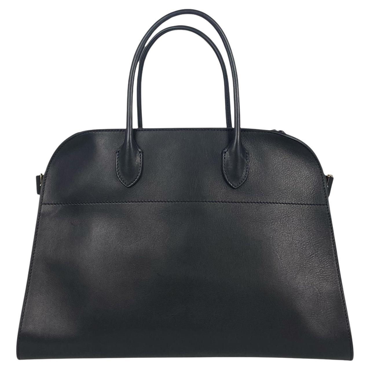 The Row Sac Margaux 15 en cuir de veau souple poli noir
