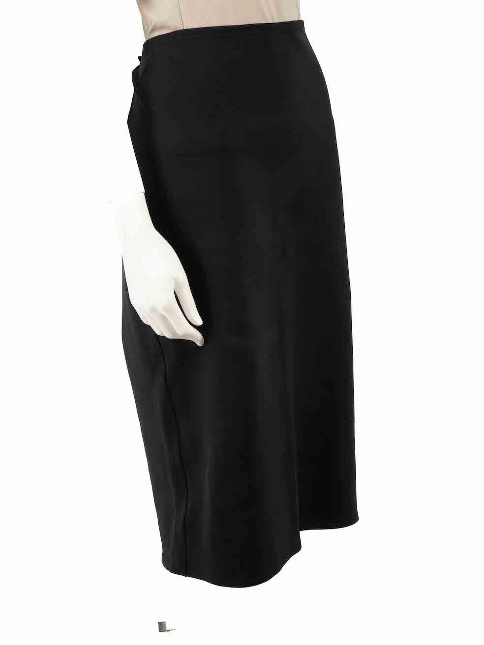 CONDITION is Never worn, with tags. No visible wear to skirt is evident on this new The Row designer resale item.
 
 Details
 Rabina
 Black
 Synthetic
 Pencil skirt
 Knee length
 Figure hugging fit
 Stretchy
 
 
 Made in USA
 
 Composition
 86%