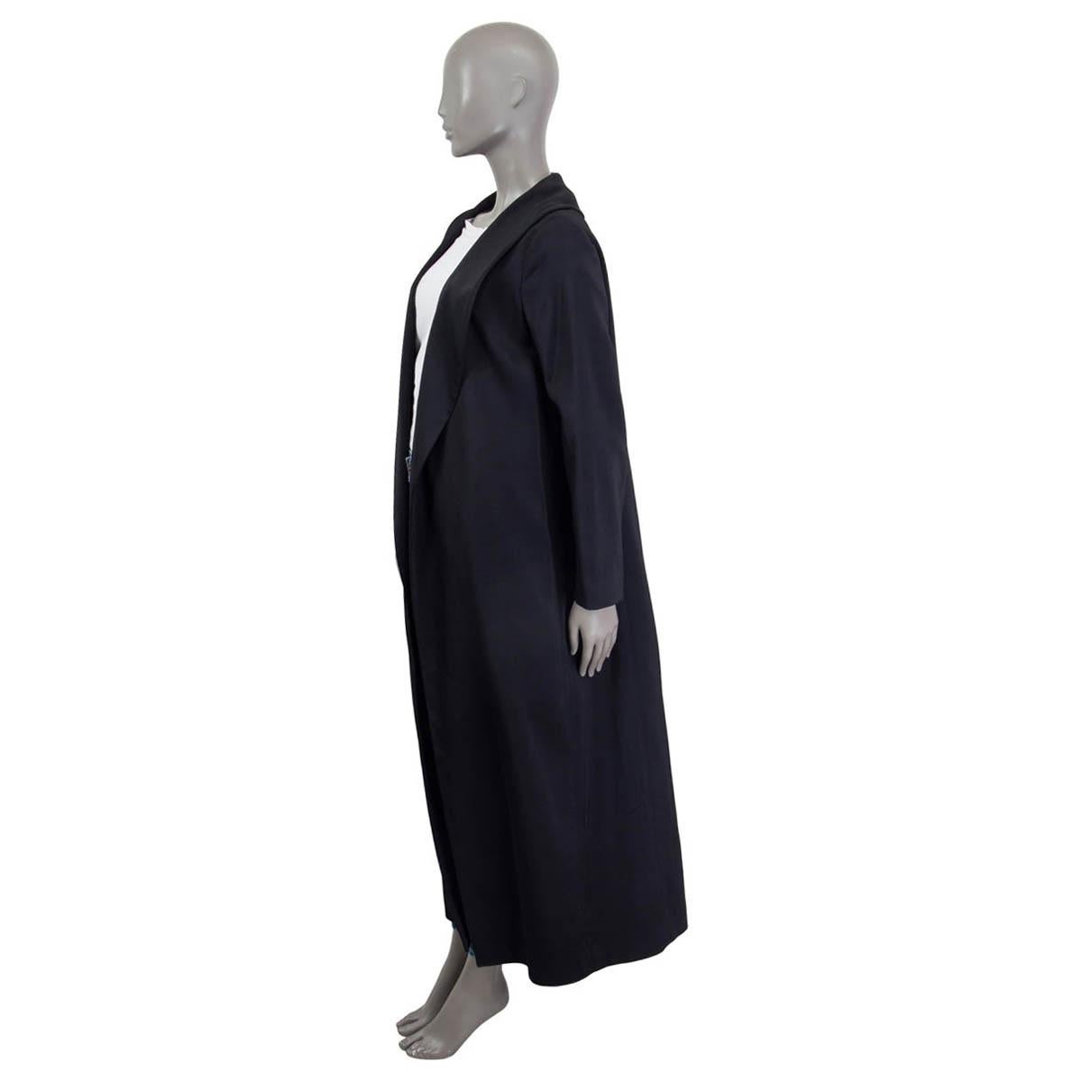 100% authentic The Row shawl collar open coat in black viscose (assumed cause tag is missing). Features two slit pockets and a slit at the back. Semi lined in black silk (assumed cause tag is missing). Has been worn and is in excellent
