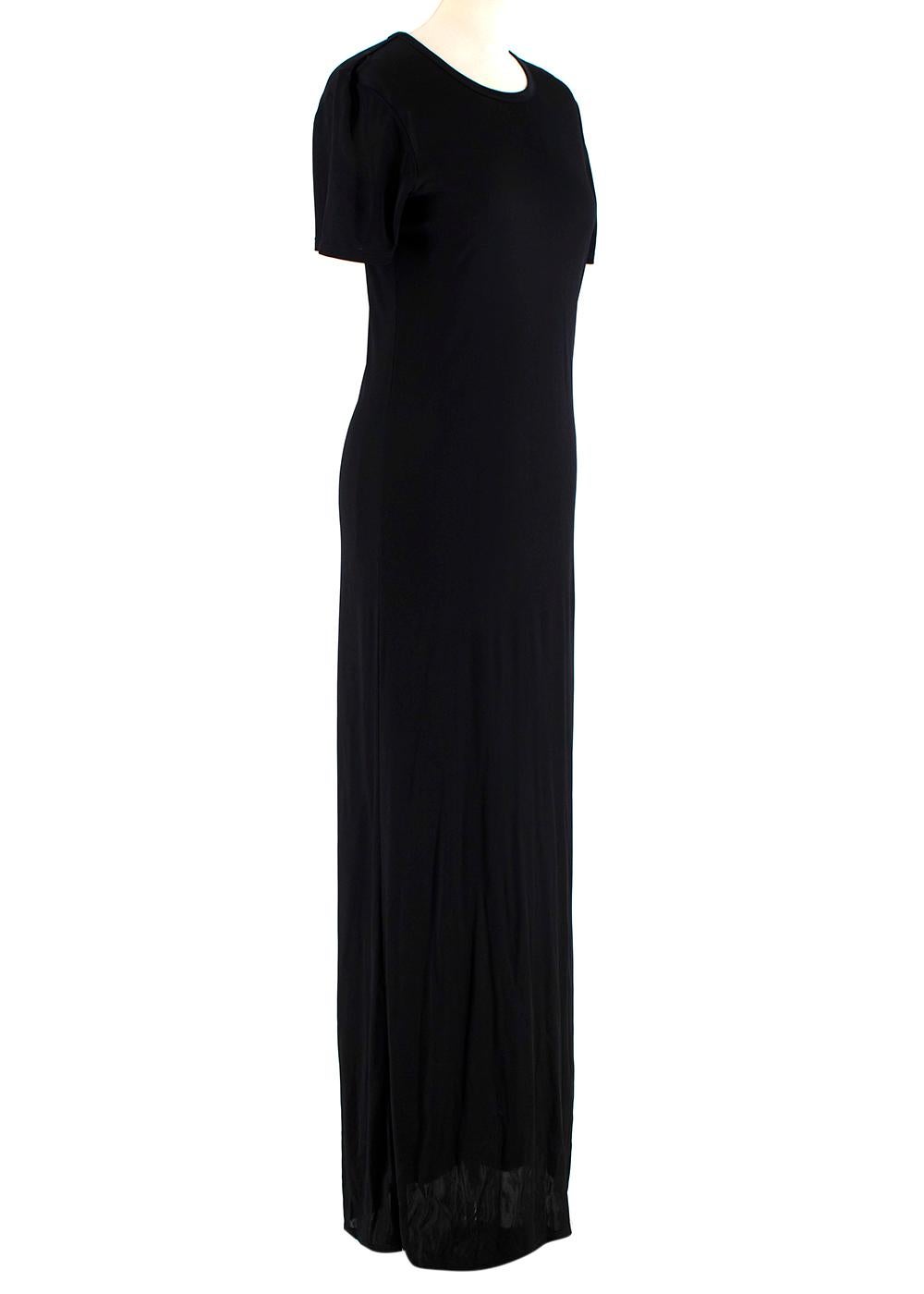 The Row Black Short Sleeve Maxi Dress

- Round neckline 
- Short sleeve 
- Maxi length

Materials
- 100% Viscose

Dry clean only

Made in USA

Approx
Measurements are taken laying flat, seam to seam. 
shoulder 40cm
sleeve 21cm
chest 41cm
waist
