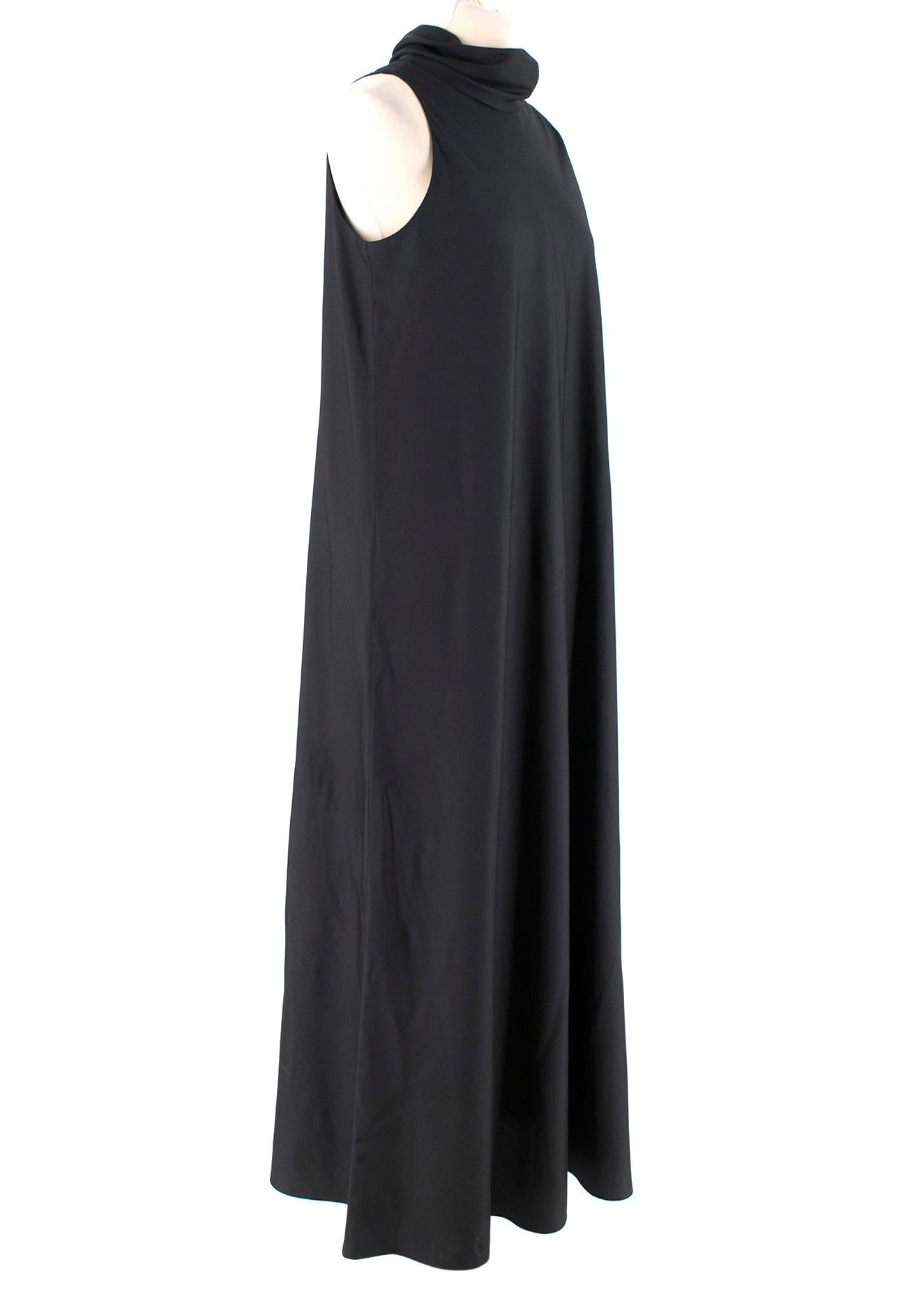The Row Black Silk Maxi Dress

- Knot Collar
- Sleveless
- Unlined

Please note, these items are pre-owned and may show signs of being stored even when unworn and unused. This is reflected within the significantly reduced price. Please refer to