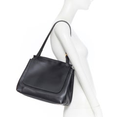 THE ROW black smooth leather minimalist flap front gold buckle shoulder bag