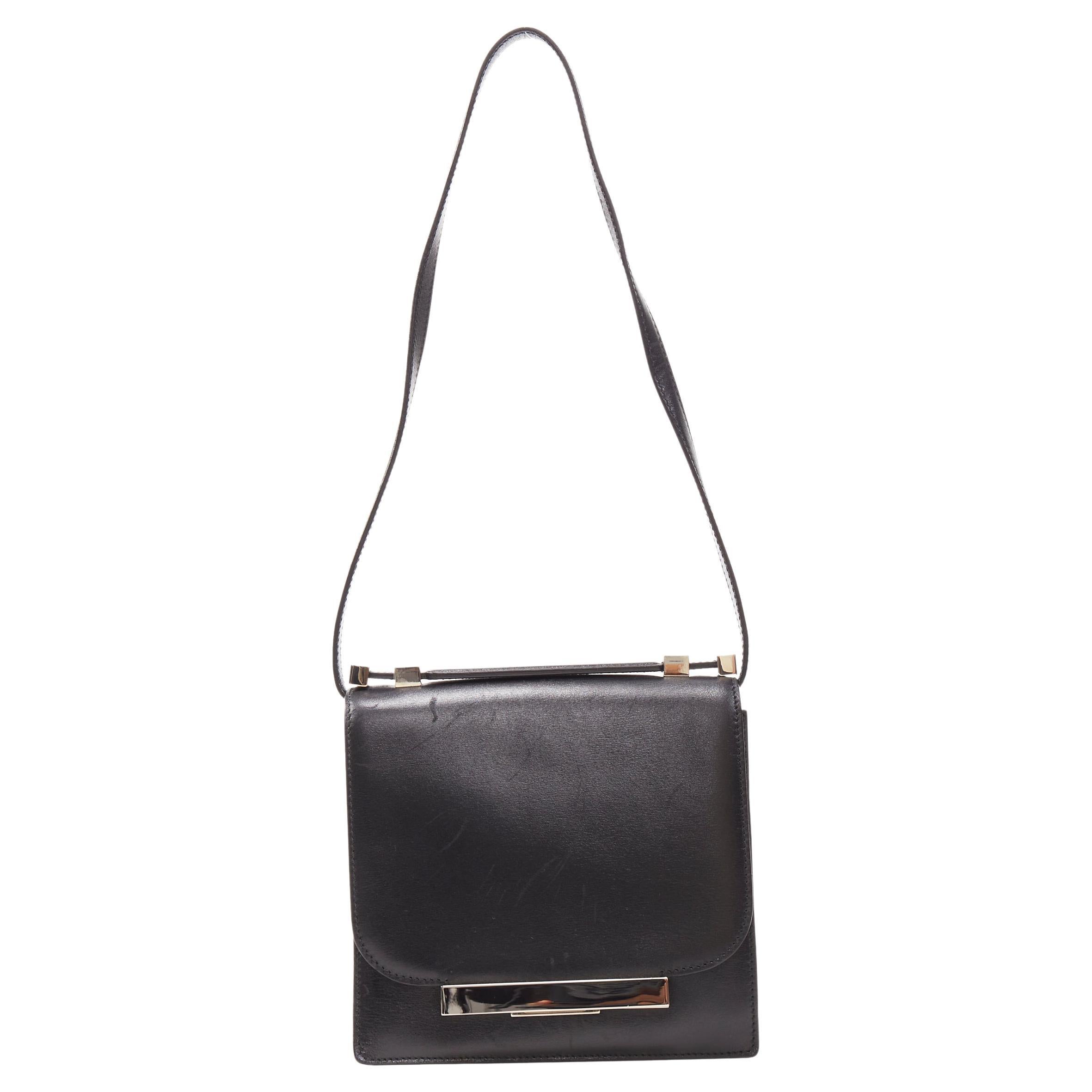 THE ROW black smooth leather silver-tone hardware push lock flap shoulder bag