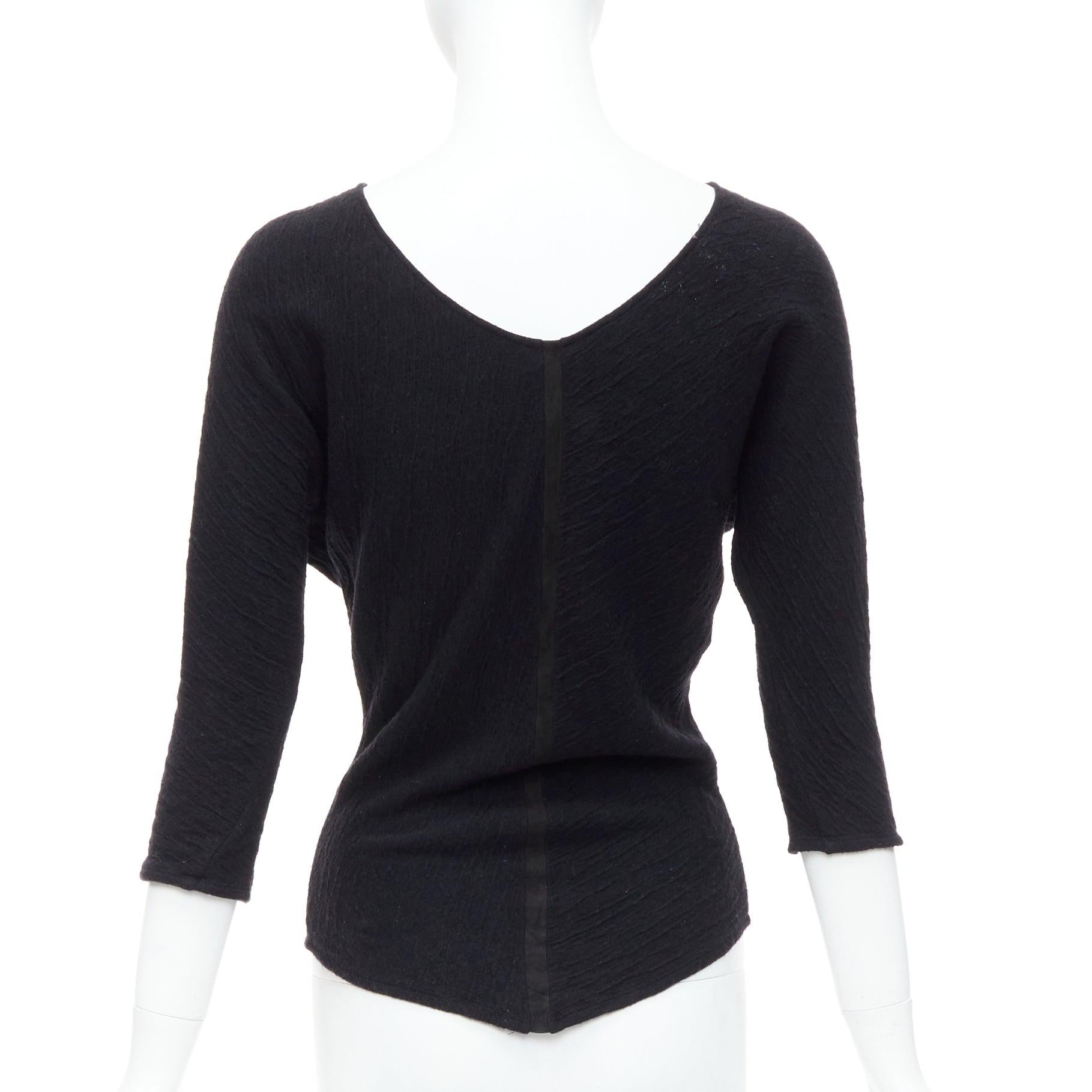 THE ROW black textured bateau neck cropped sleeve pullover top
Reference: ECLO/A00024
Brand: The Row
Designer: Mary Kate and Ashley Olsen
Material: Fabric
Color: Black
Pattern: Solid
Closure: Slip On
Extra Details: Black tape at center back.
Made