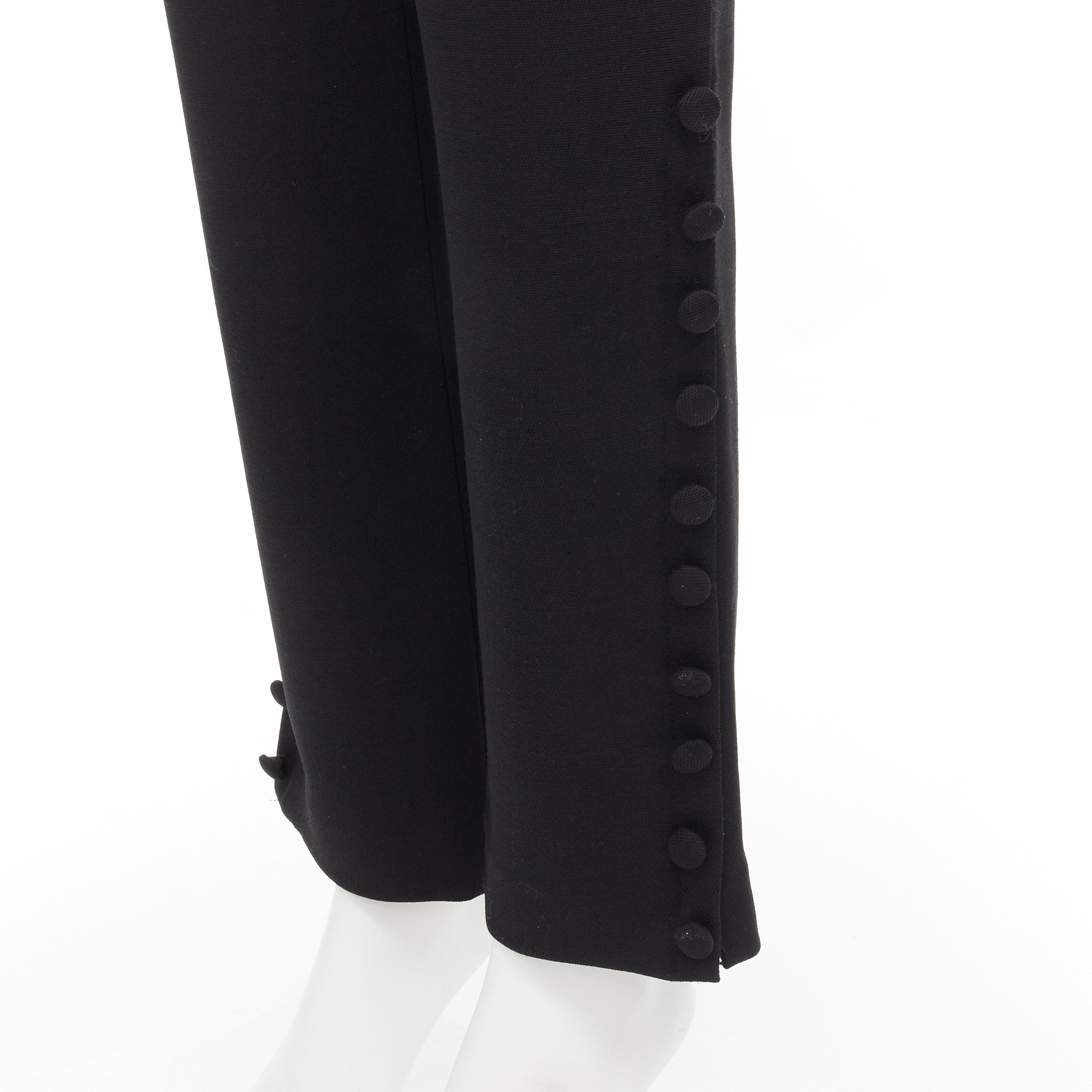THE ROW black virgin wool button hem straight leg trousers pants US2 XS 
Reference: MELK/A00073 
Brand: The Row 
Material: Wool 
Color: Black 
Pattern: Solid 
Closure: Zip 
Extra Detail: Dual side pockets. Decorative button at hem. Concealed zip at