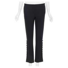THE Row pantaloni a gamba tesa in lana vergine nera con orlo a bottoni US2 XS