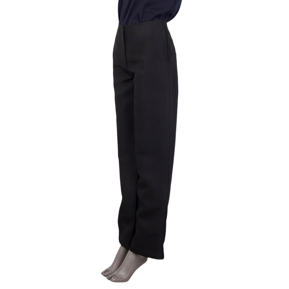 100% authentic The Row wide-leg pants in black viscose (87%) and silk (13%). Feature two slit pocktes on the front and two patch pockets on the back. Open with a concealed button, hook and zipper on the front. Lined in black cotton (100%). Have been