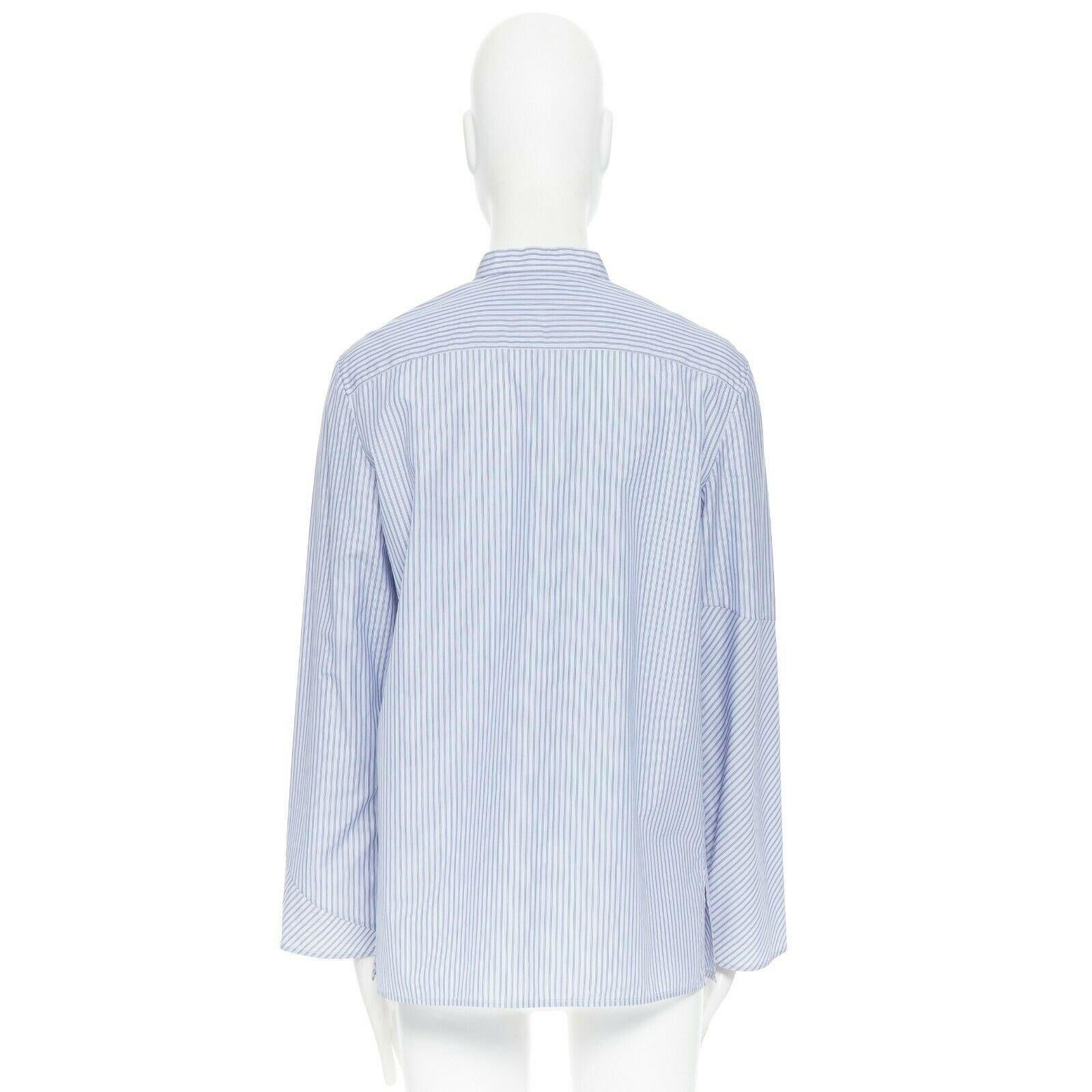 Blue THE ROW blue 100% cotton pinstripe band collar asymmetric button-up shirt US2