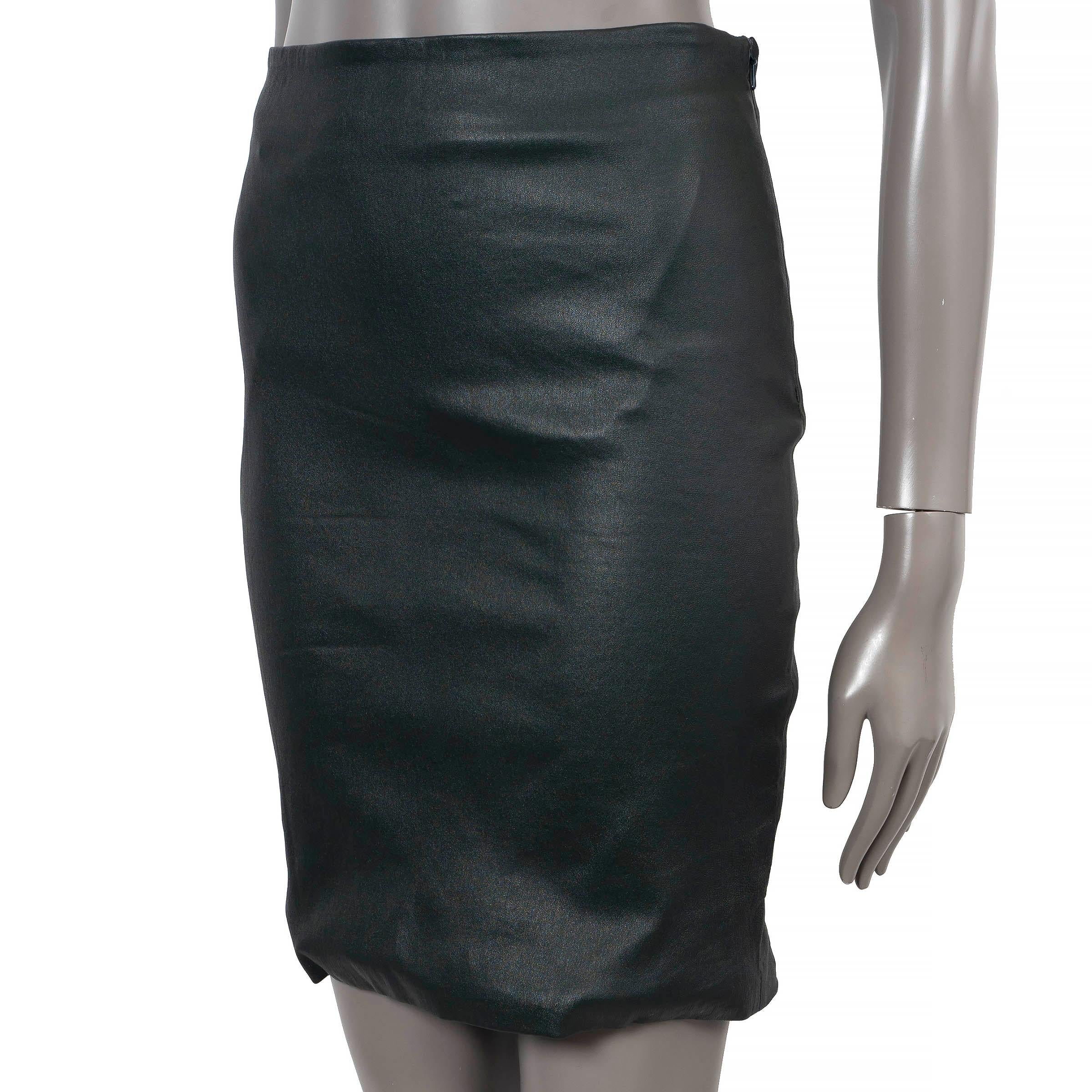 100% authentic The Row Loattan straight mini skirt in bottle green stretch lambskin leather. Opens with a concealed zipper on the side. Lined in silk (with 5% elastane). Has been worn and is in excellent condition.

Measurements
Tag